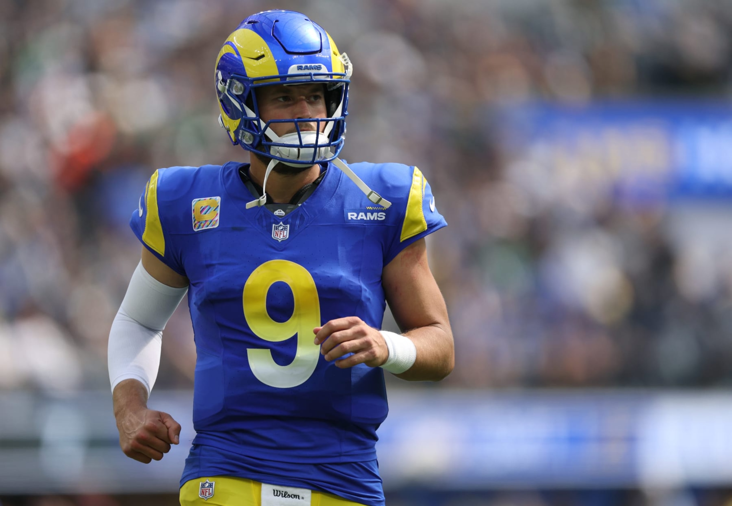 INGLEWOOD, CALIFORNIA - OCTOBER 08: Matthew Stafford #9 of the Los Angeles Rams comes to a huddle during a 23-14 loss to the Philadelphia Eagles at SoFi Stadium on October 08, 2023 in Inglewood, California. (Photo by Harry How/Getty Images)