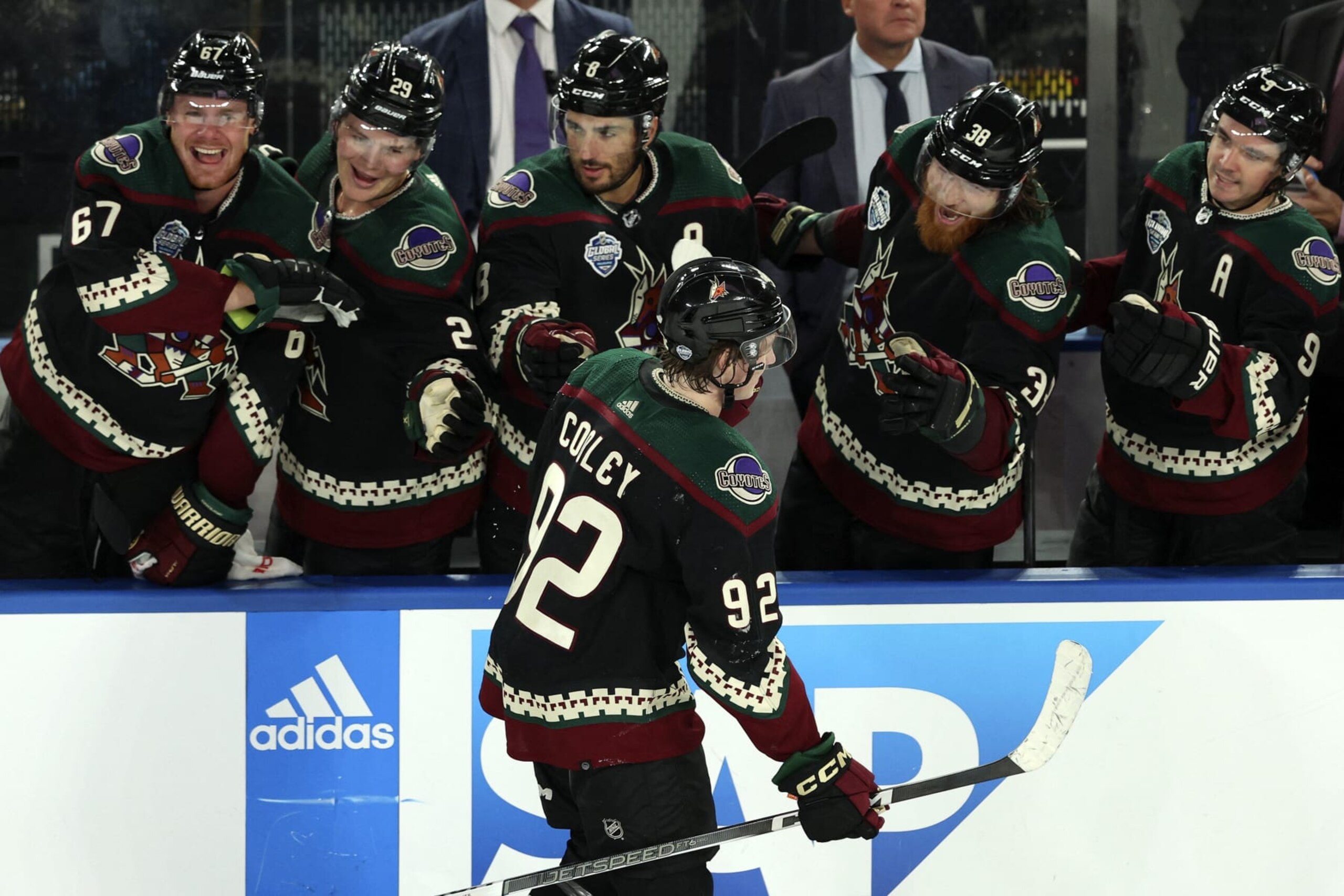 Arizona Coyotes' #92 Logan Cooley celebrates a goal with teammates during the NHL Global Series match between the Los Angeles Kings and the Arizona Coyotes at Rod Laver Arena in Melbourne on September 23, 2023. (Photo by Martin KEEP / AFP) / - IMAGE RESTRICTED TO EDITORIAL USE - STRICTLY NO COMMERCIAL USE- (Photo by MARTIN KEEP/AFP via Getty Images) Arizona Coyotes' #92 Logan Cooley celebrates a goal with teammates during the NHL Global Series match between the Los Angeles Kings and the Arizona Coyotes at Rod Laver Arena in Melbourne on September 23, 2023. (Photo by Martin KEEP / AFP) / - IMAGE RESTRICTED TO EDITORIAL USE - STRICTLY NO COMMERCIAL USE- (Photo by MARTIN KEEP/AFP via Getty Images)