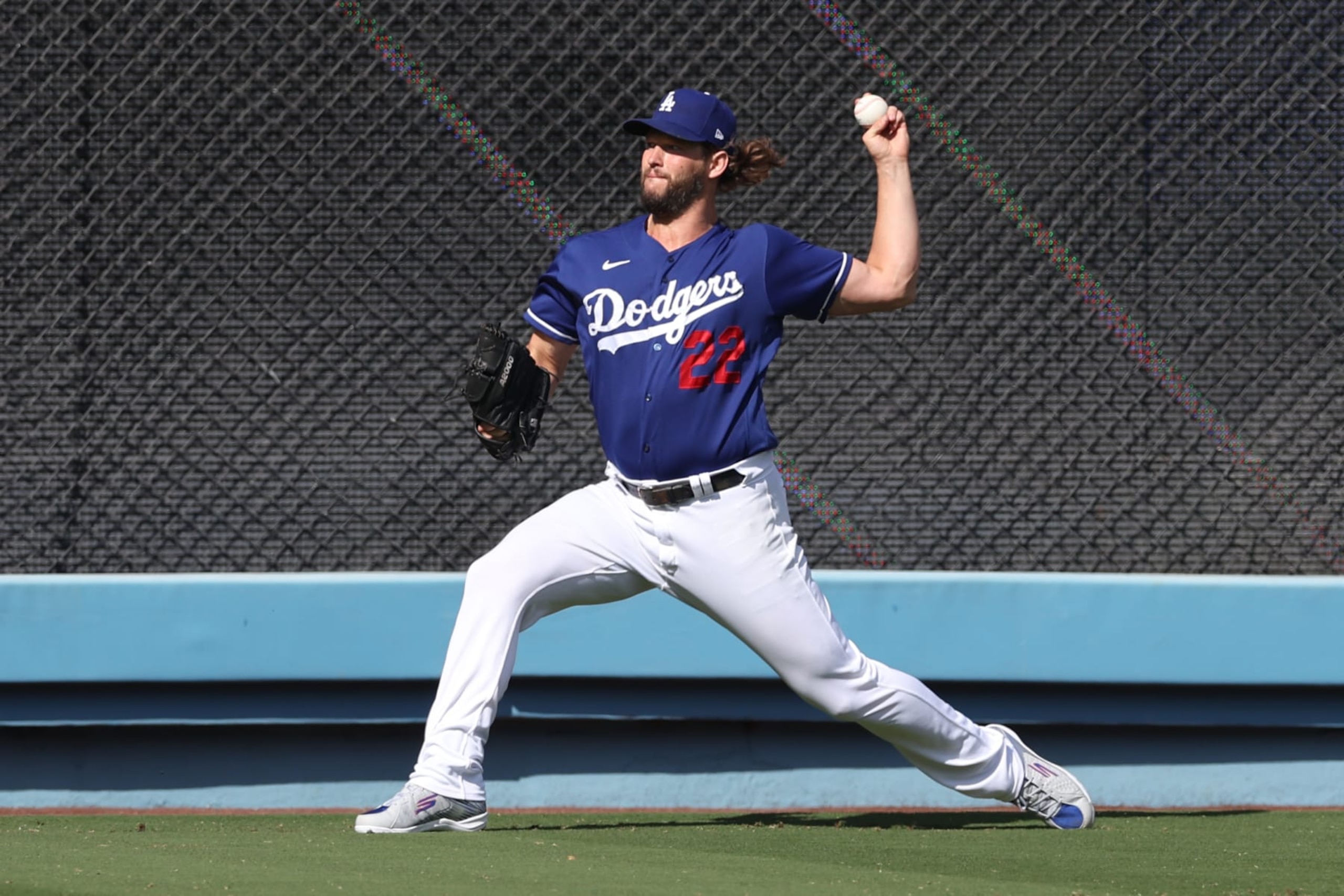 LOS ANGELES, CA - OCTOBER 09: Clayton Kershaw #22 of the Los Angeles Dodgers warms up prior to Game 2 of the Division Series between the Arizona Diamondbacks and the Los Angeles Dodgers at Dodger Stadium on Monday, October 9, 2023 in Los Angeles, California. (Photo by Rob Leiter/MLB Photos via Getty Images)