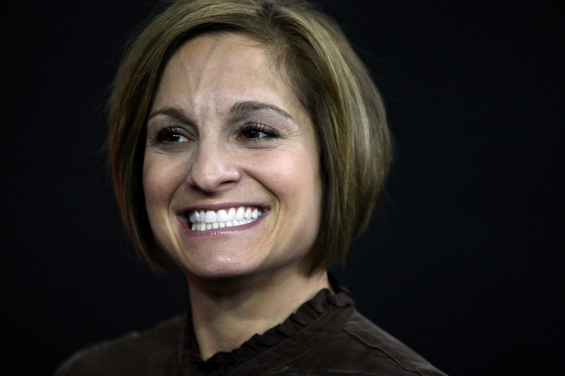HOFFMAN ESTATES, IL - FEBRUARY 21:  Mary Lou Retton, former Olympic Gold Medalist in Women's Gymnastics, looks on during the 2009 Tyson American Cup at the Sears Centre on February 21, 2009 in Hoffman Estates, Illinois.  (Photo by Jonathan Daniel/Getty Images)