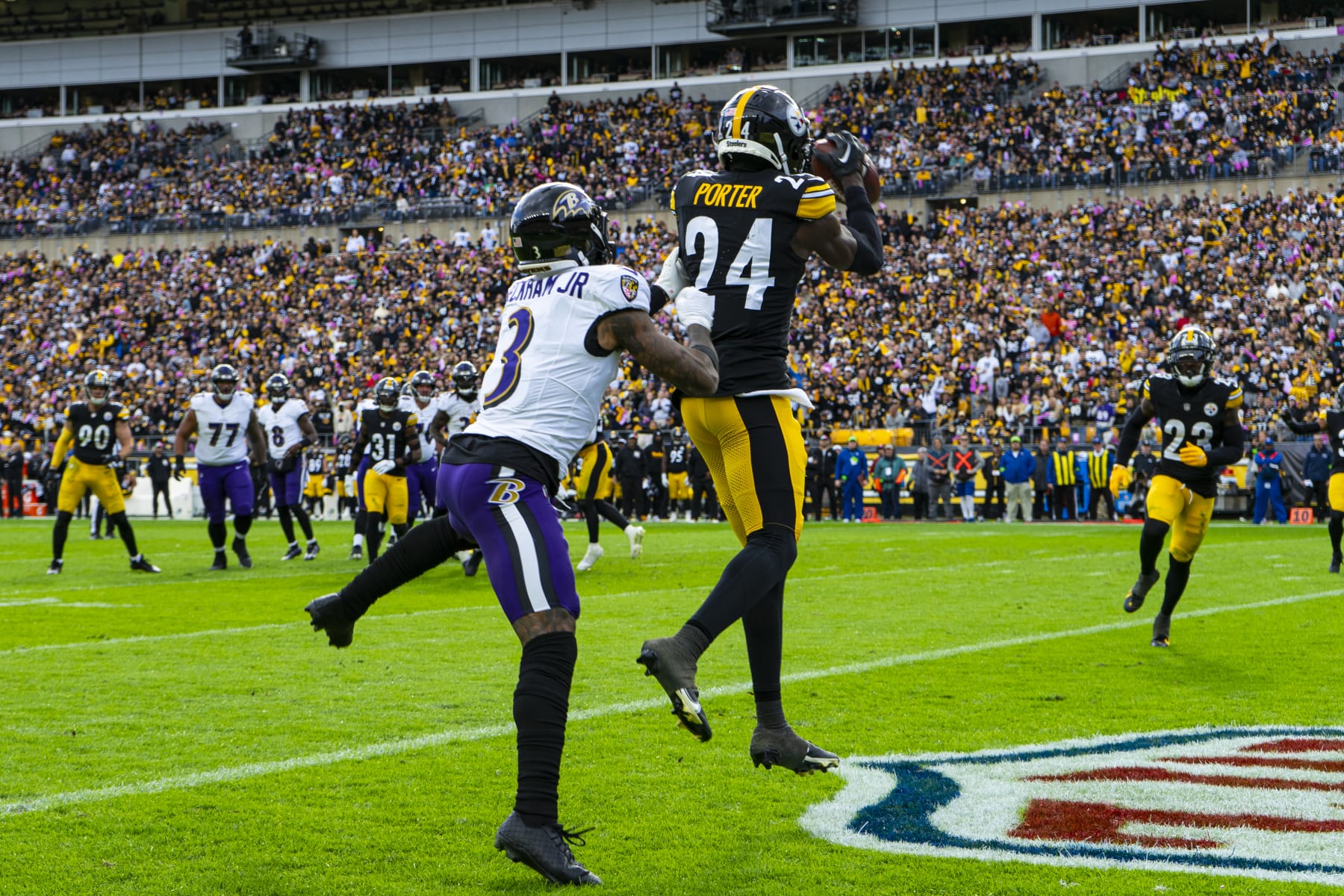 PITTSBURGH, PA - OCTOBER 08: Pittsburgh Steelers cornerback Joey Porter Jr. (24) makes an interception in the end zone during the regular season NFL football game between the Baltimore Ravens and Pittsburgh Steelers on October 08, 2023 at Acrisure Stadium in Pittsburgh, PA. (Photo by Mark Alberti/Icon Sportswire via Getty Images)