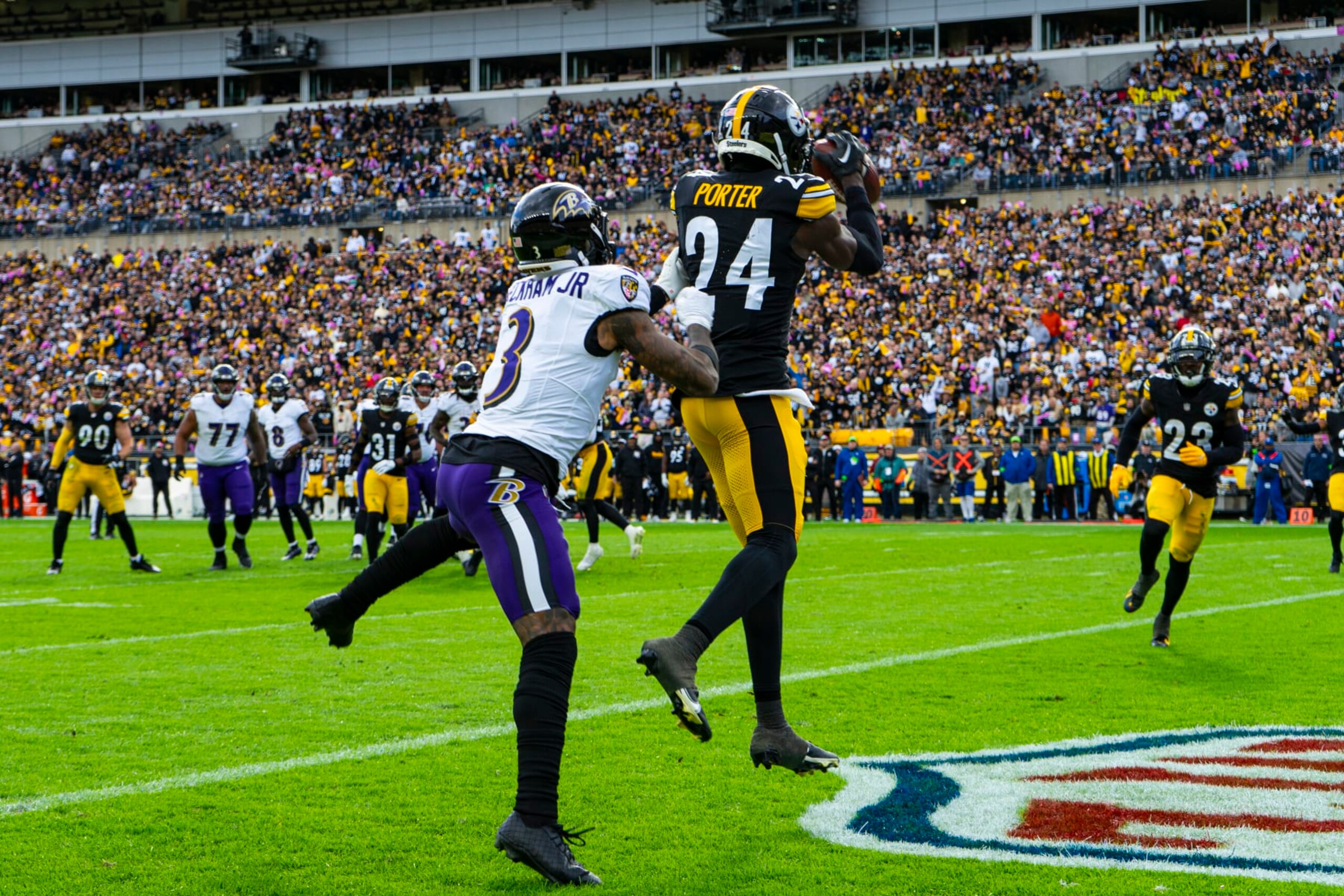 PITTSBURGH, PA - OCTOBER 08: Pittsburgh Steelers cornerback Joey Porter Jr. (24) makes an interception in the end zone during the regular season NFL football game between the Baltimore Ravens and Pittsburgh Steelers on October 08, 2023 at Acrisure Stadium in Pittsburgh, PA. (Photo by Mark Alberti/Icon Sportswire via Getty Images)