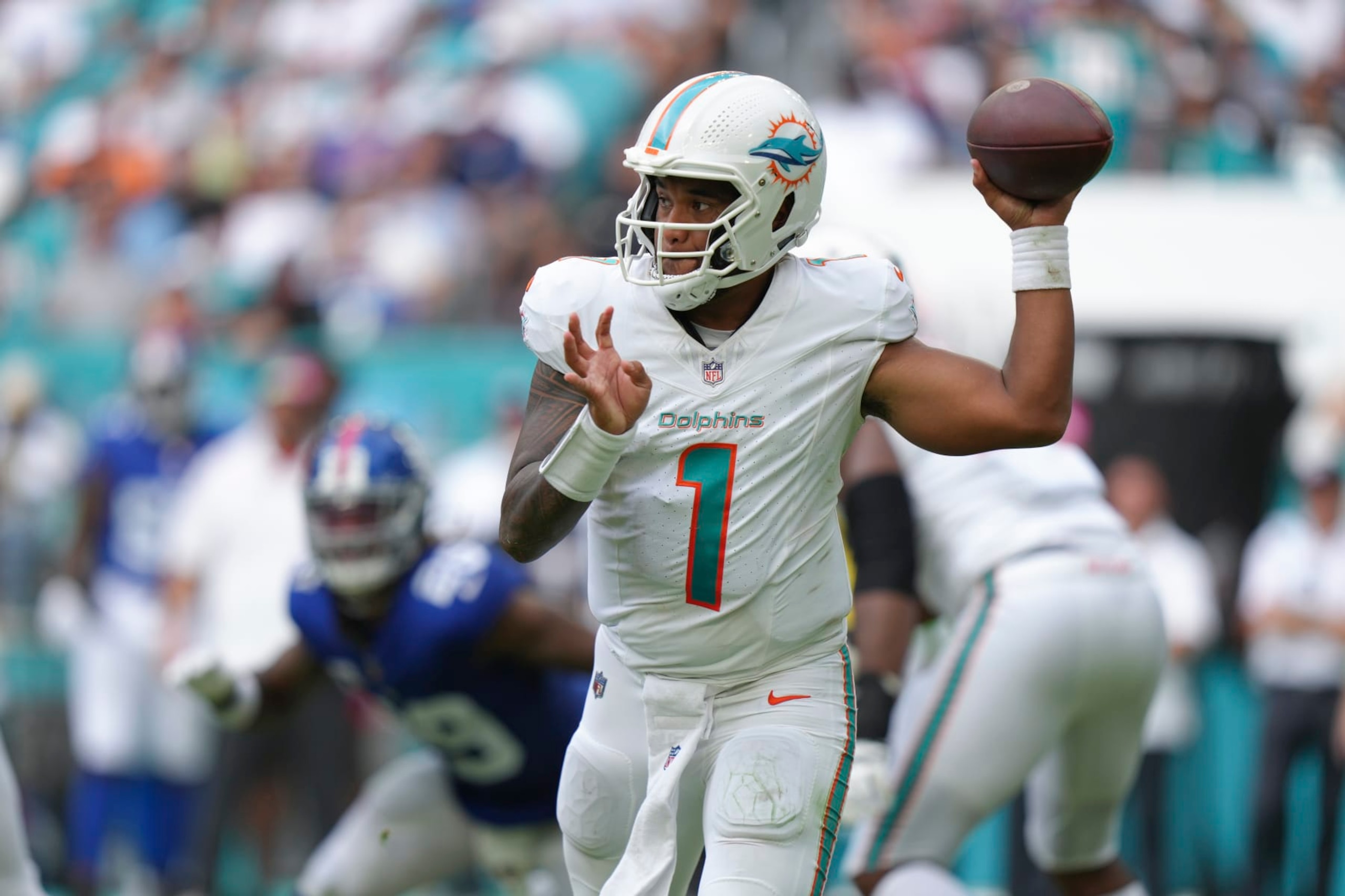 MIAMI GARDENS, FL - OCTOBER 08: Miami Dolphins quarterback Tua Tagovailoa (1) makes a pass attempt in the second half during the game between the New York Giants and the Miami Dolphins on Sunday, October 8, 2023 at Hard Rock Stadium, Miami Gardens, Fla. (Photo by Peter Joneleit/Icon Sportswire via Getty Images)