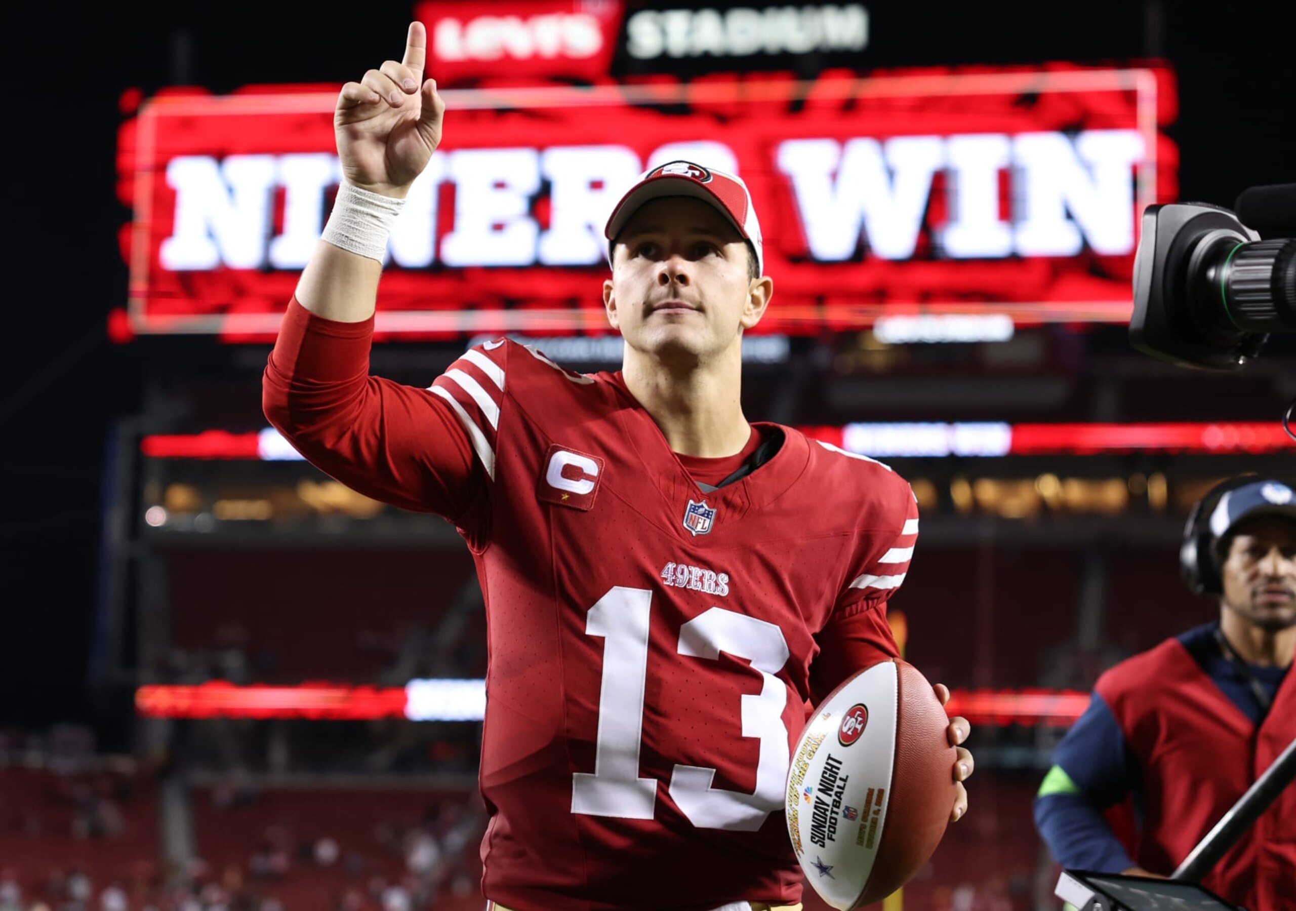 SANTA CLARA, CALIFORNIA - OCTOBER 08: Brock Purdy #13 of the San Francisco 49ers reacts after a 42-10 victory against the Dallas Cowboys at Levi's Stadium on October 08, 2023 in Santa Clara, California. (Photo by Ezra Shaw/Getty Images)