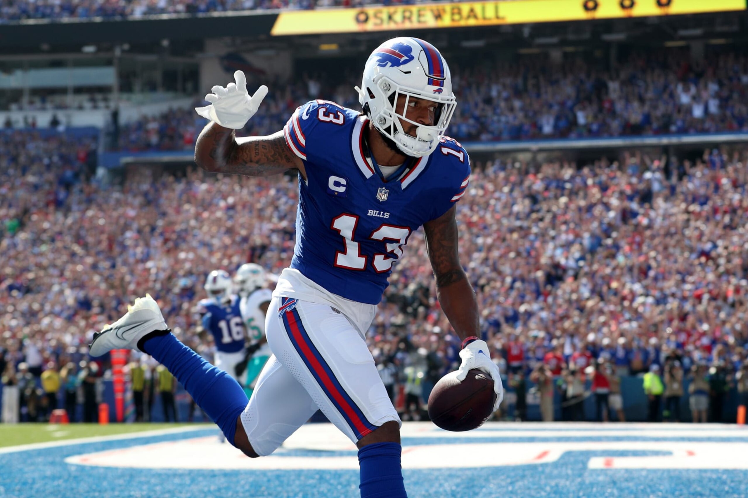 ORCHARD PARK, NEW YORK - OCTOBER 01: Gabe Davis #13 of the Buffalo Bills makes a touchdown reception against the Miami Dolphins during the first quarter at Highmark Stadium on October 01, 2023 in Orchard Park, New York. (Photo by Bryan M. Bennett/Getty Images) ORCHARD PARK, NEW YORK - OCTOBER 01: Gabe Davis #13 of the Buffalo Bills makes a touchdown reception against the Miami Dolphins during the first quarter at Highmark Stadium on October 01, 2023 in Orchard Park, New York. (Photo by Bryan M. Bennett/Getty Images)
