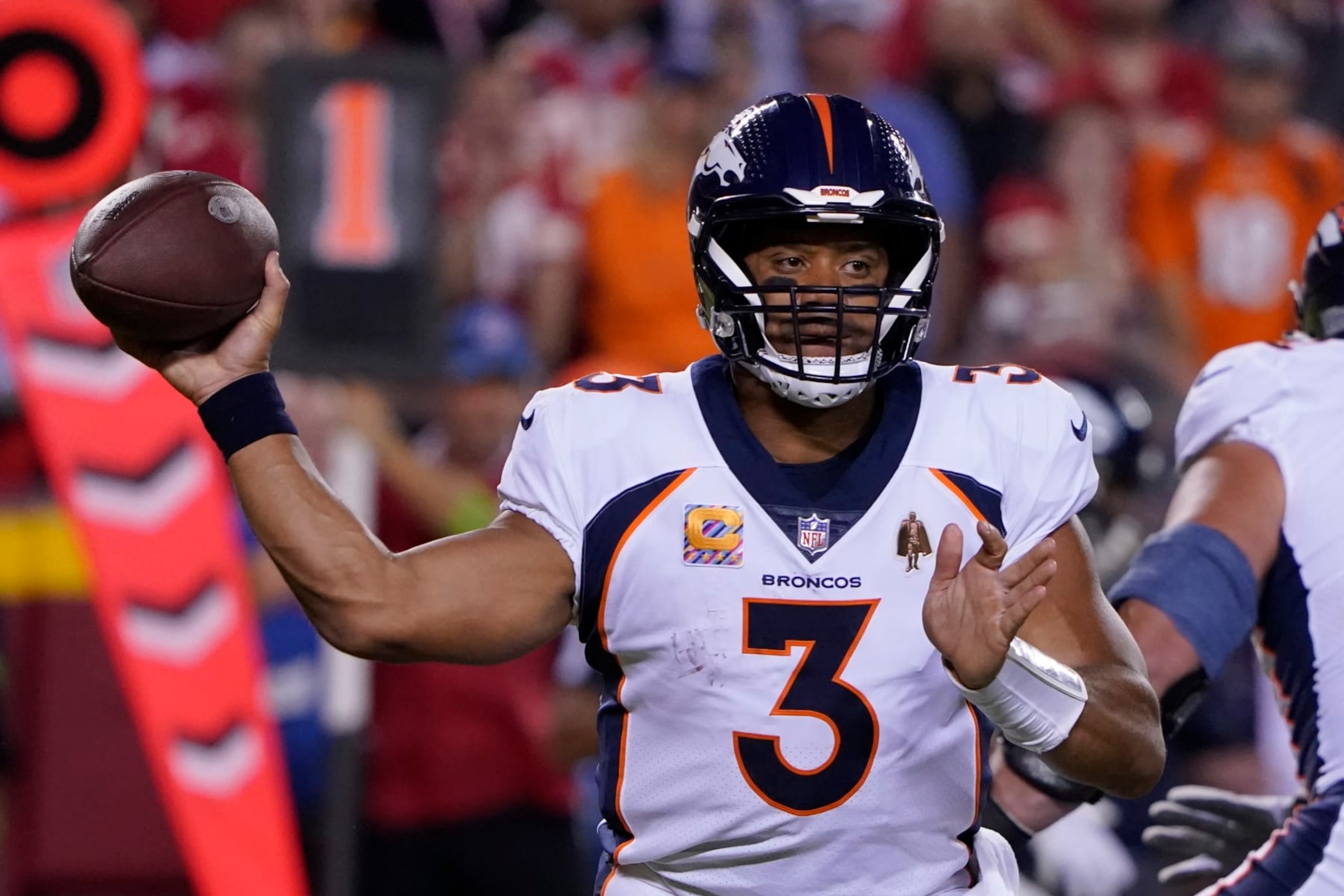 Denver Broncos quarterback Russell Wilson throws during the first half of an NFL football game against the Kansas City Chiefs, Thursday, Oct. 12, 2023, in Kansas City, Mo. (AP Photo/Ed Zurga) Denver Broncos quarterback Russell Wilson throws during the first half of an NFL football game against the Kansas City Chiefs, Thursday, Oct. 12, 2023, in Kansas City, Mo. (AP Photo/Ed Zurga)