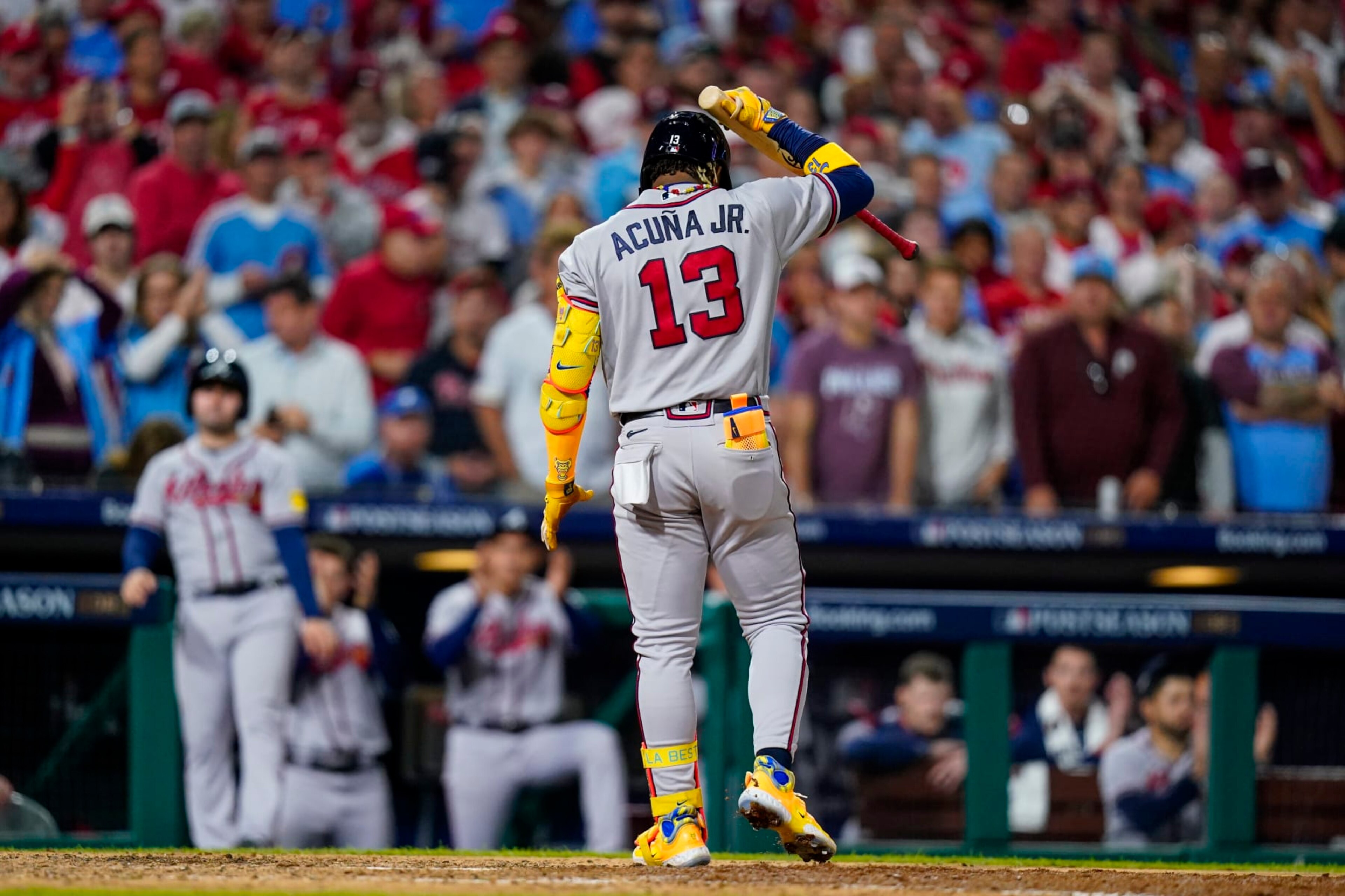 Atlanta Braves' Ronald Acuna Jr. reacts after flying out with bases loaded during the seventh inning of Game 4 of a baseball NL Division Series against the Philadelphia Phillies Thursday, Oct. 12, 2023, in Philadelphia. (AP Photo/Chris Szagola) Atlanta Braves' Ronald Acuna Jr. reacts after flying out with bases loaded during the seventh inning of Game 4 of a baseball NL Division Series against the Philadelphia Phillies Thursday, Oct. 12, 2023, in Philadelphia. (AP Photo/Chris Szagola)