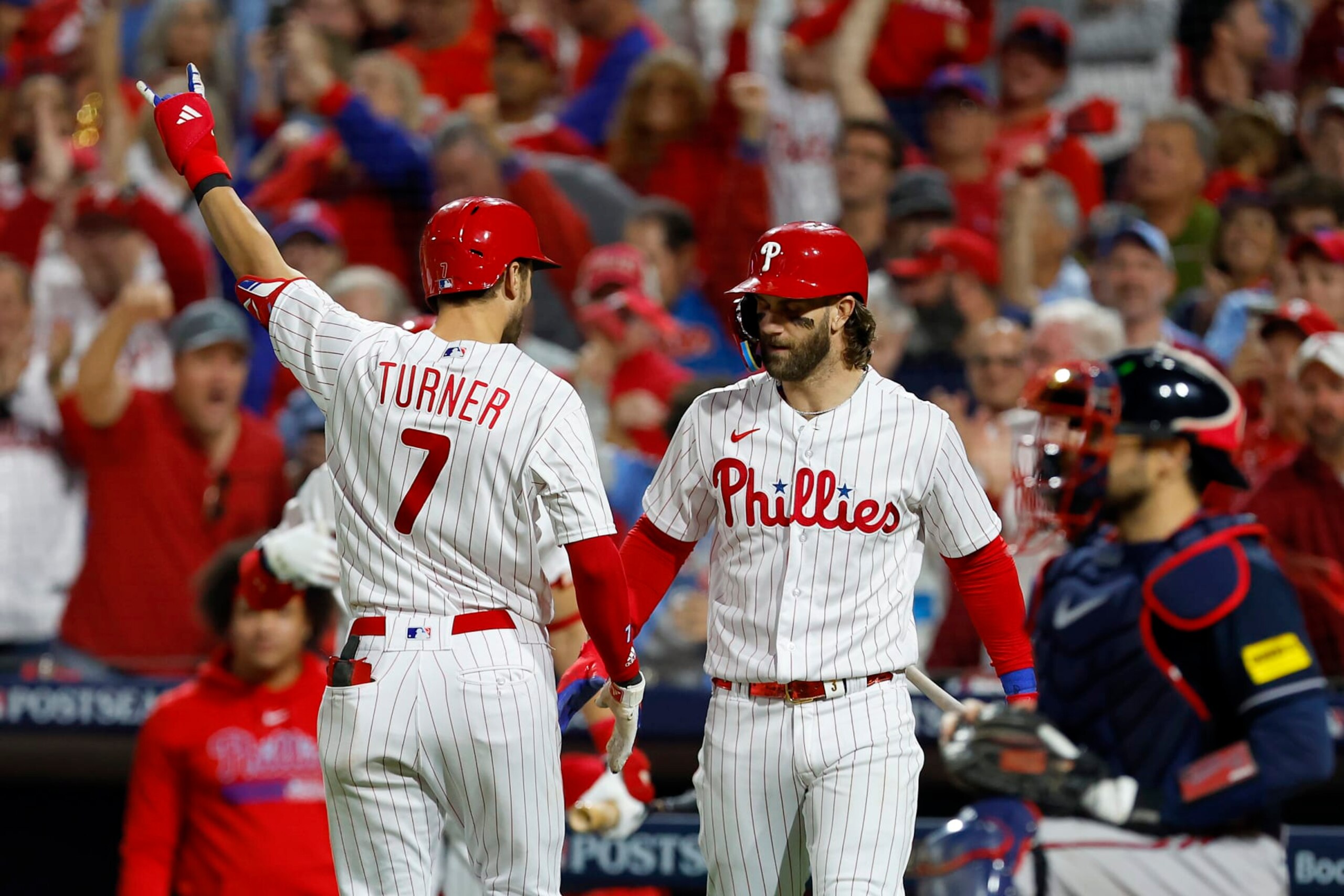 Trea Turner (L) and Bryce Harper (R)