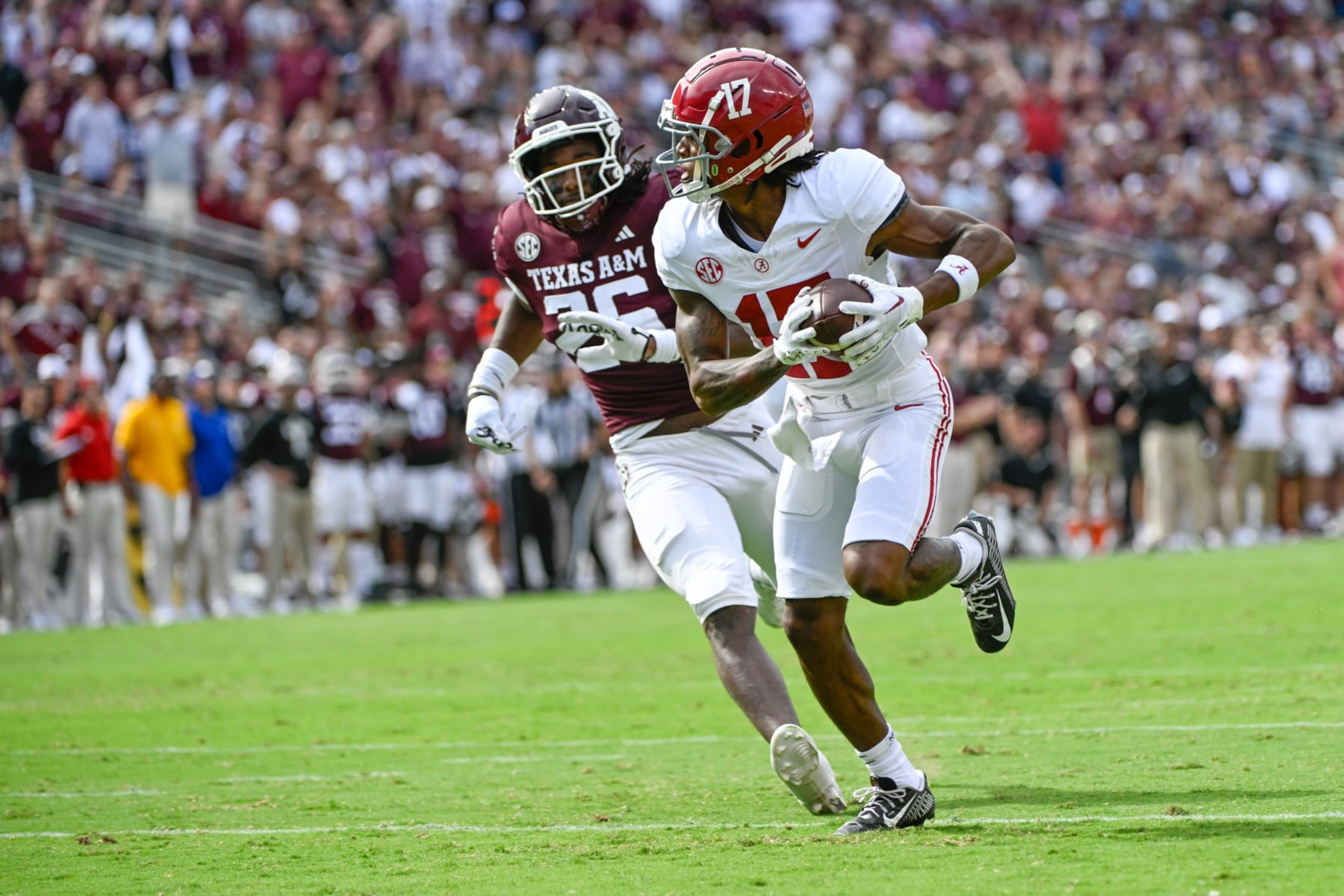 COLLEGE STATION, TX - OCTOBER 07: Alabama Crimson Tide wide receiver Isaiah Bond (17) hauls in a long first half touchdown reception as Texas A&M Aggies defensive back Demani Richardson (26) defends during the football game between the Alabama Crimson Tide and Texas A&M Aggies at Kyle Field on October 7, 2023, in College Station, Texas. (Photo by Ken Murray/Icon Sportswire via Getty Images) COLLEGE STATION, TX - OCTOBER 07: Alabama Crimson Tide wide receiver Isaiah Bond (17) hauls in a long first half touchdown reception as Texas A&M Aggies defensive back Demani Richardson (26) defends during the football game between the Alabama Crimson Tide and Texas A&M Aggies at Kyle Field on October 7, 2023, in College Station, Texas. (Photo by Ken Murray/Icon Sportswire via Getty Images)