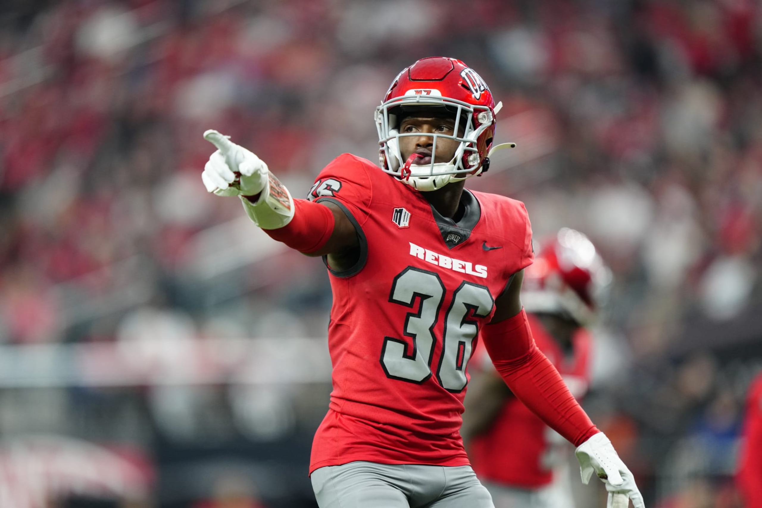 LAS VEGAS, NEVADA - SEPTEMBER 30: Thomas Anderson #36 of the UNLV Rebels gestures in the second half of a game against the Hawaii Warriors at Allegiant Stadium on September 30, 2023 in Las Vegas, Nevada. Rebels defeat the Warriors 44-20. (Photo by Louis Grasse/Getty Images) LAS VEGAS, NEVADA - SEPTEMBER 30: Thomas Anderson #36 of the UNLV Rebels gestures in the second half of a game against the Hawaii Warriors at Allegiant Stadium on September 30, 2023 in Las Vegas, Nevada. Rebels defeat the Warriors 44-20. (Photo by Louis Grasse/Getty Images)