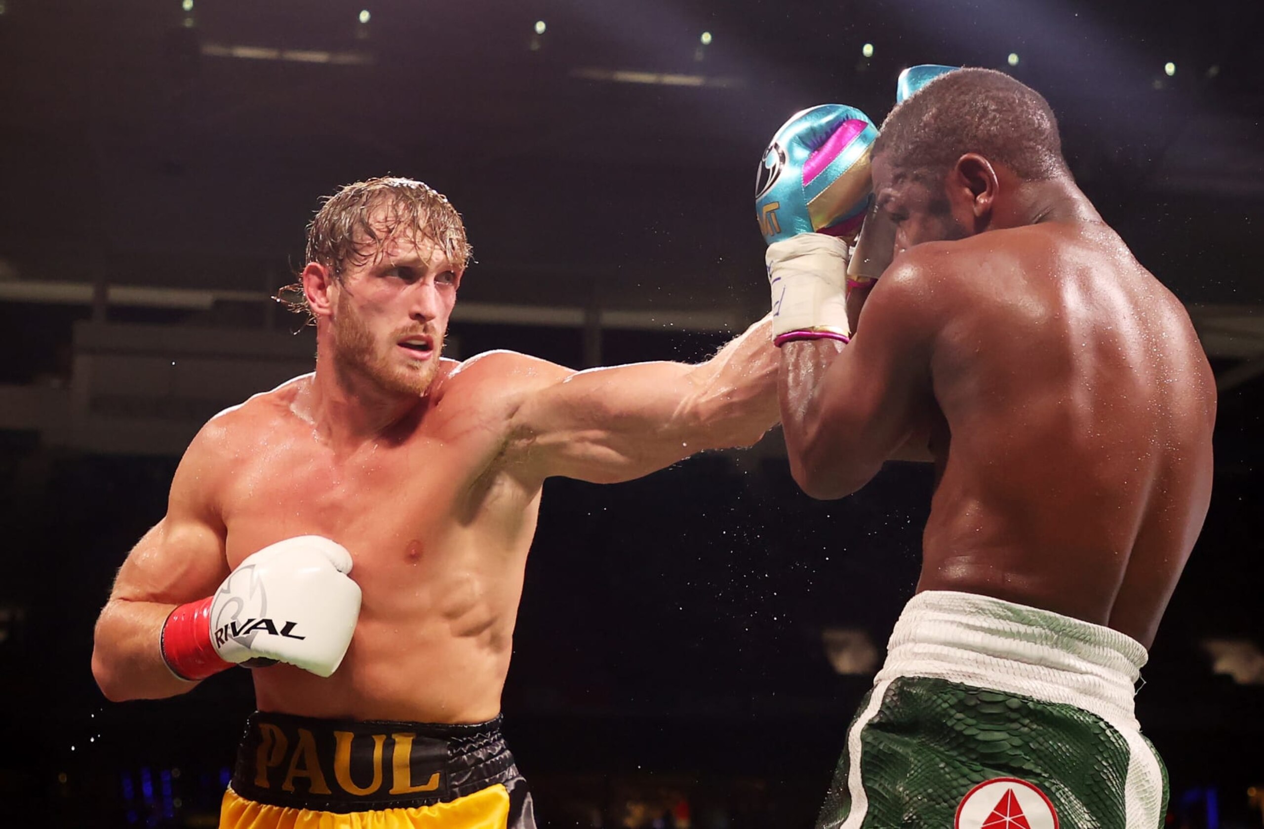 Logan Paul punches Floyd Mayweather