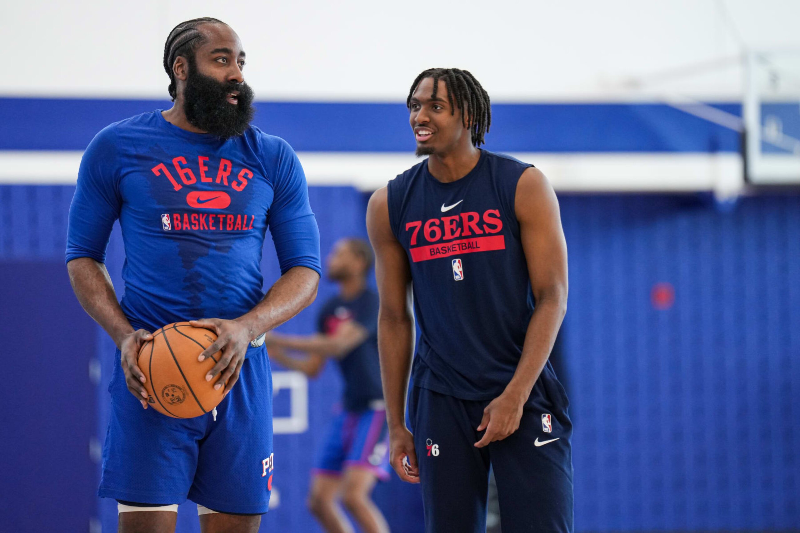 CAMDEN, NJ - MARCH 20: James Harden #1 and Tyrese Maxey #0 of the Philadelphia 76ers talk during a shoot around to honor the 1982-83 Philadelphia 76ers Championship team on March 20, 2023 at Philadelphia 76ers Training Complex in Camden, New Jersey. NOTE TO USER: User expressly acknowledges and agrees that, by downloading and/or using this Photograph, user is consenting to the terms and conditions of the Getty Images License Agreement. Mandatory Copyright Notice: Copyright 2023 NBAE (Photo by Jesse D. Garrabrant/NBAE via Getty Images)