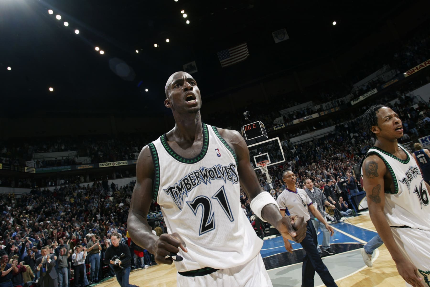 MINNEAPOLIS - FEBRUARY 11:  Kevin Garnett #21 of the Minnesota Timberwolves celebrates during the game against the Dallas Mavericks at Target Center on February 11, 2003 in Minneapolis, Minnesota.  The Timberwolves won 100-98.  NOTE TO USER: User expressly acknowledges and agrees that, by downloading and/or using this Photograph, User is consenting to the terms and conditions of the Getty Images License Agreement.  Mandatory copyright notice: Copyright 2003 NBAE  (Photo by: David Sherman/NBAE via Getty Images)