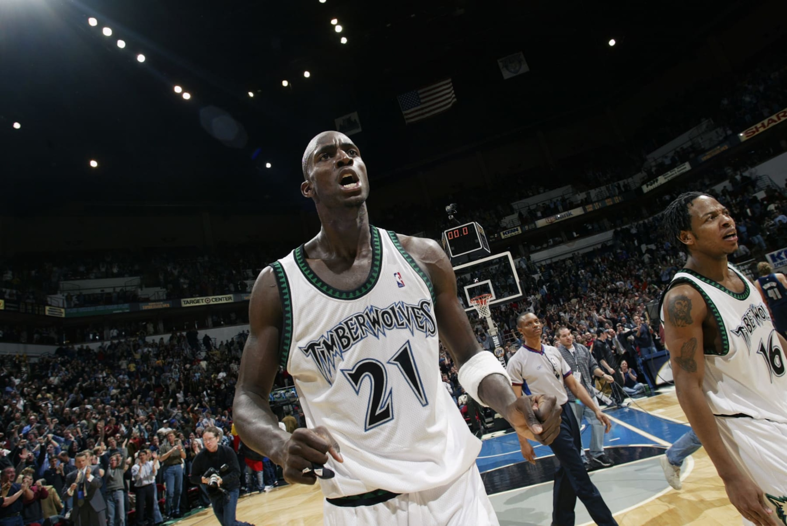 MINNEAPOLIS - FEBRUARY 11:  Kevin Garnett #21 of the Minnesota Timberwolves celebrates during the game against the Dallas Mavericks at Target Center on February 11, 2003 in Minneapolis, Minnesota.  The Timberwolves won 100-98.  NOTE TO USER: User expressly acknowledges and agrees that, by downloading and/or using this Photograph, User is consenting to the terms and conditions of the Getty Images License Agreement.  Mandatory copyright notice: Copyright 2003 NBAE  (Photo by: David Sherman/NBAE via Getty Images)