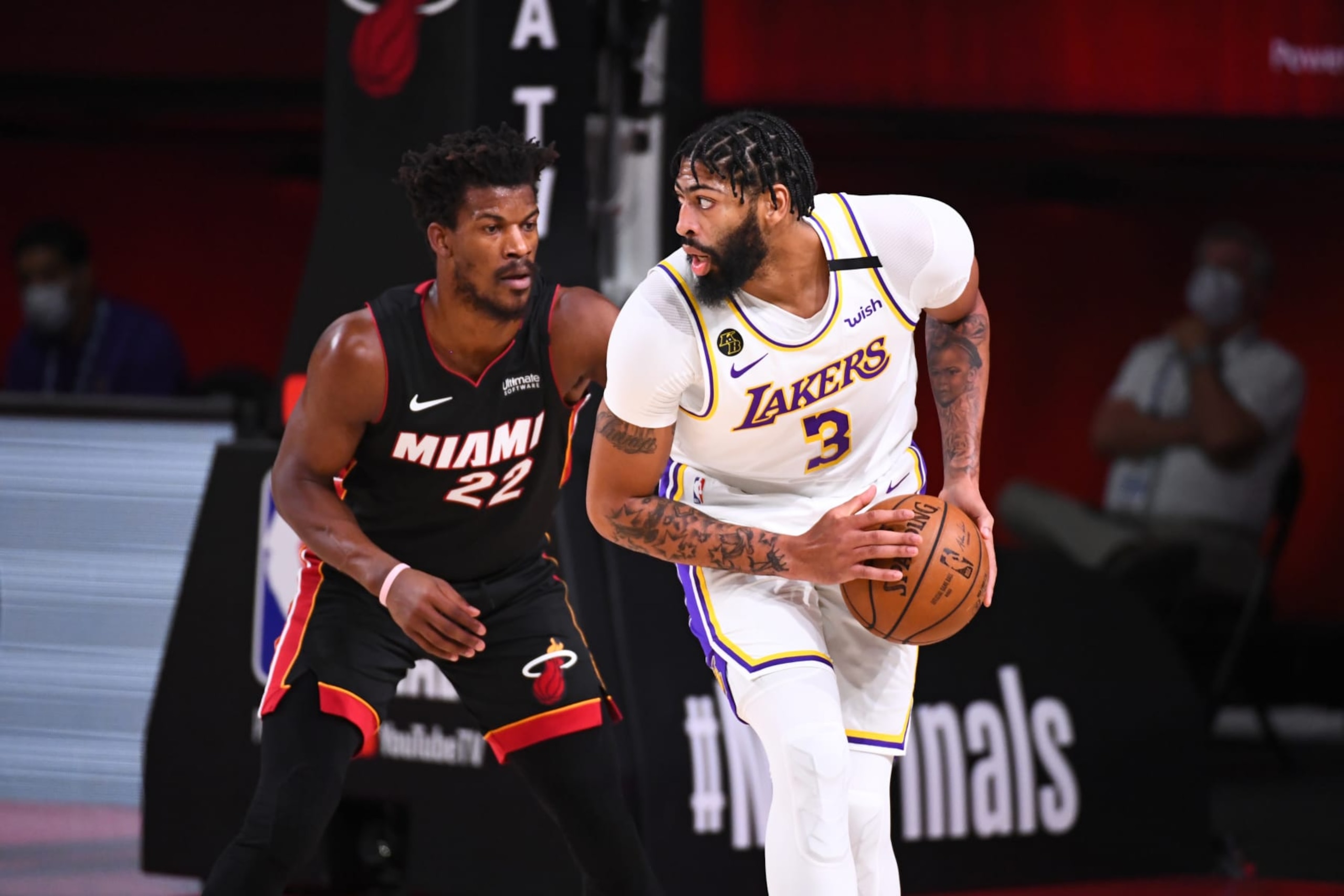 ORLANDO, FL - OCTOBER 11: Anthony Davis #3 of the Los Angeles Lakers handles the ball against Jimmy Butler #22 of the Miami Heat during Game Six of the NBA Finals on October 11, 2020 at the AdventHealth Arena at ESPN Wide World Of Sports Complex in Orlando, Florida. NOTE TO USER: User expressly acknowledges and agrees that, by downloading and/or using this Photograph, user is consenting to the terms and conditions of the Getty Images License Agreement. Mandatory Copyright Notice: Copyright 2020 NBAE (Photo by Garrett Ellwood/NBAE via Getty Images)