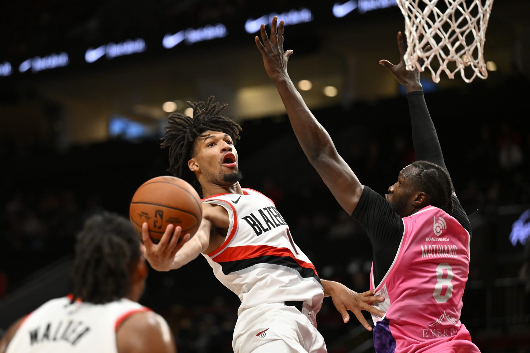 PORTLAND, OREGON - OCTOBER 10: Shaedon Sharpe #17 of the Portland Trail Blazers in action against Mangok Mathiang #8 of the New Zealand Breakers during the second quarter of the exhibition game at Moda Center on October 10, 2023 in Portland, Oregon. NOTE TO USER: User expressly acknowledges and agrees that, by downloading and or using this Photograph, user is consenting to the terms and conditions of the Getty Images License Agreement.  (Photo by Alika Jenner/Getty Images)