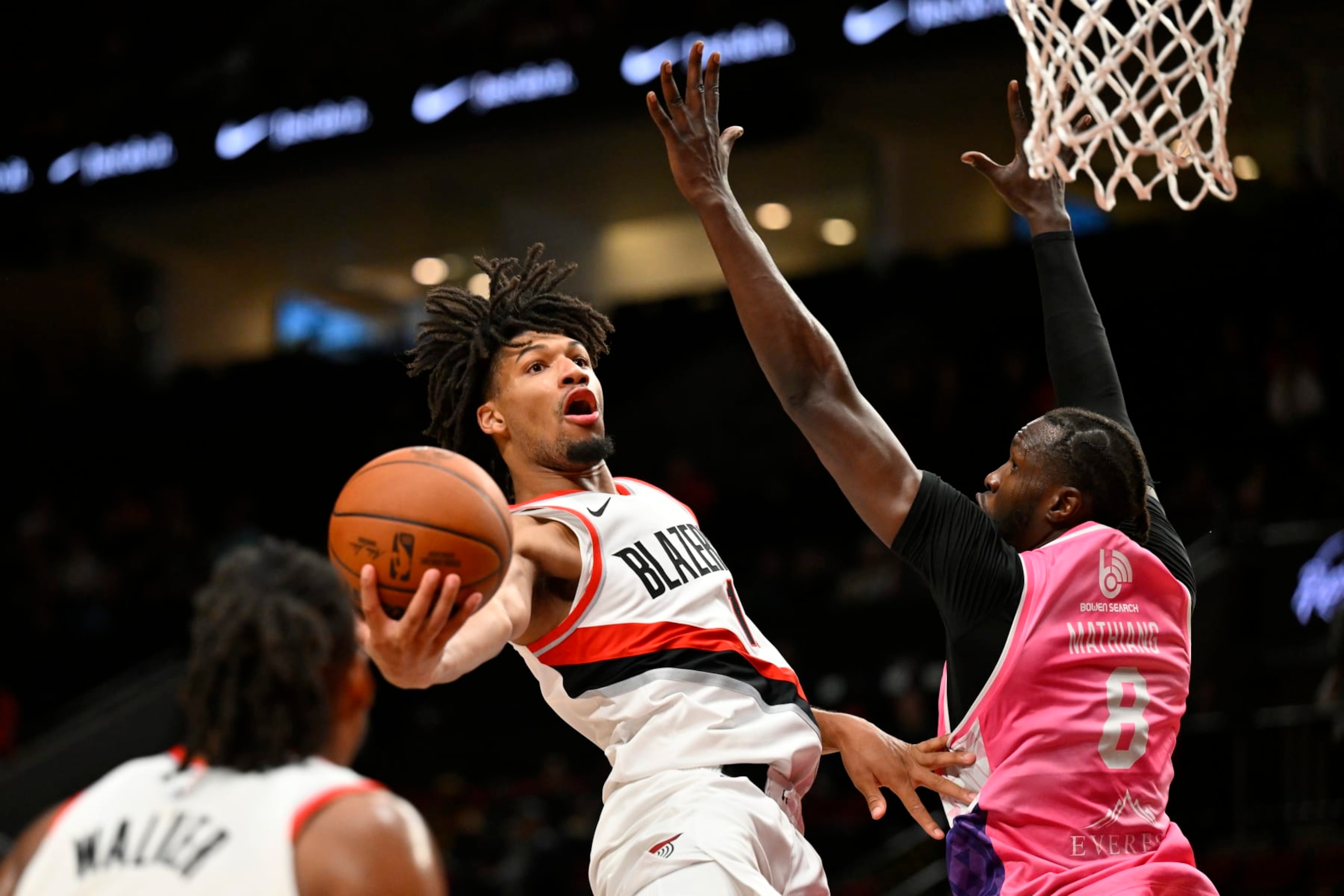 PORTLAND, OREGON - OCTOBER 10: Shaedon Sharpe #17 of the Portland Trail Blazers in action against Mangok Mathiang #8 of the New Zealand Breakers during the second quarter of the exhibition game at Moda Center on October 10, 2023 in Portland, Oregon. NOTE TO USER: User expressly acknowledges and agrees that, by downloading and or using this Photograph, user is consenting to the terms and conditions of the Getty Images License Agreement.  (Photo by Alika Jenner/Getty Images)