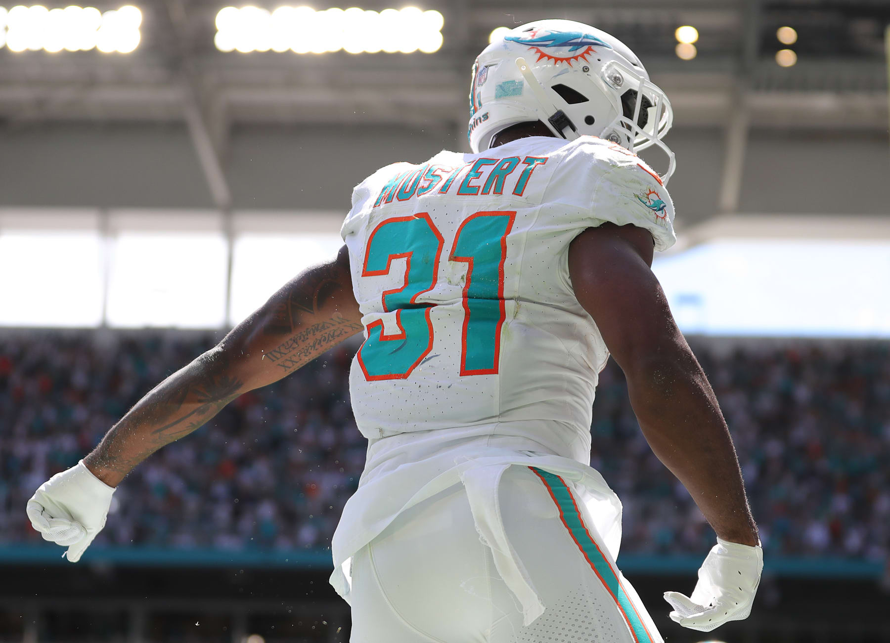 MIAMI GARDENS, FLORIDA - SEPTEMBER 24: Raheem Mostert #31 of the Miami Dolphins reacts after a play during the first half against the Denver Broncos at Hard Rock Stadium on September 24, 2023 in Miami Gardens, Florida. (Photo by Megan Briggs/Getty Images)