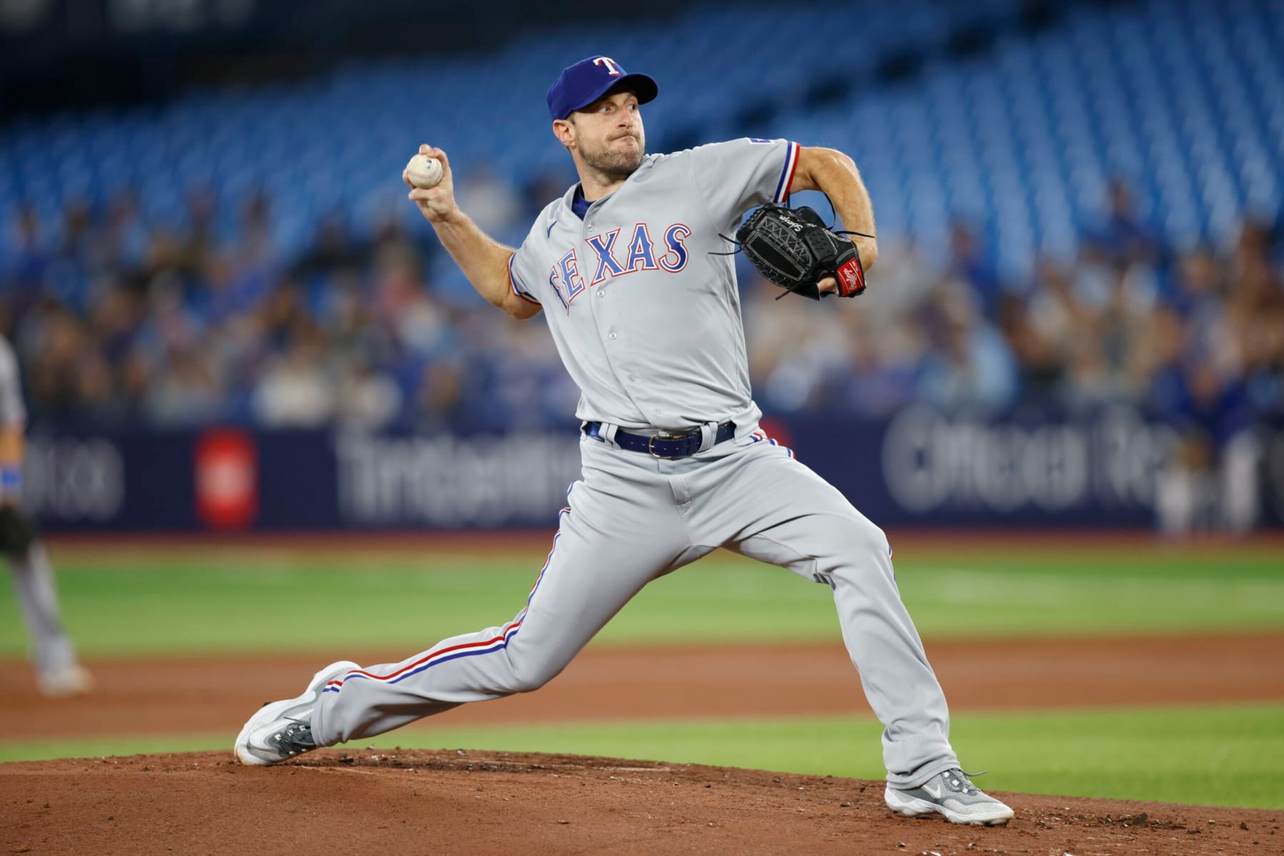 TORONTO, CANADA - SEPTEMBER 12: Max Scherzer #31 of the Texas Rangers pitches in the first inning of their MLB game against the Toronto Blue Jays at Rogers Centre on September 12, 2023 in Toronto, Canada. (Photo by Cole Burston/Getty Images)