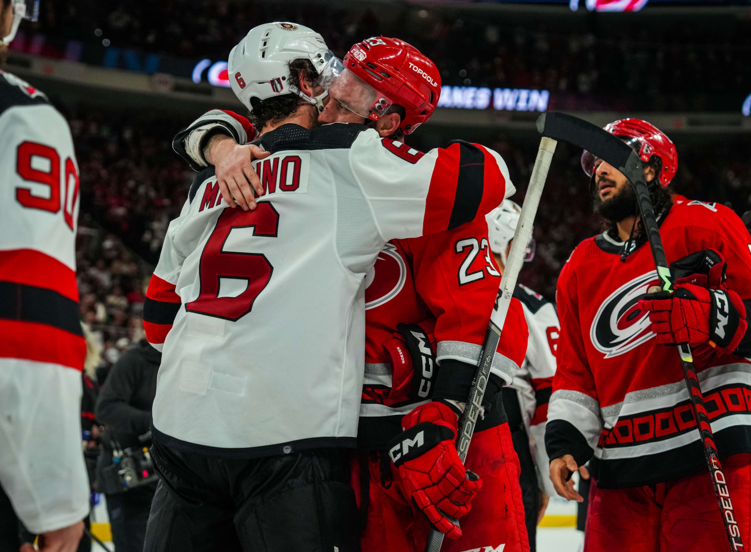 RALEIGH, NORTH CAROLINA - MAY 11: The Carolina Hurricanes and the New Jersey Devils shake hands after Game Five of the Second Round of the 2023 Stanley Cup Playoffs at PNC Arena on May 11, 2023 in Raleigh, North Carolina. (Photo by Josh Lavallee/NHLI via Getty Images)