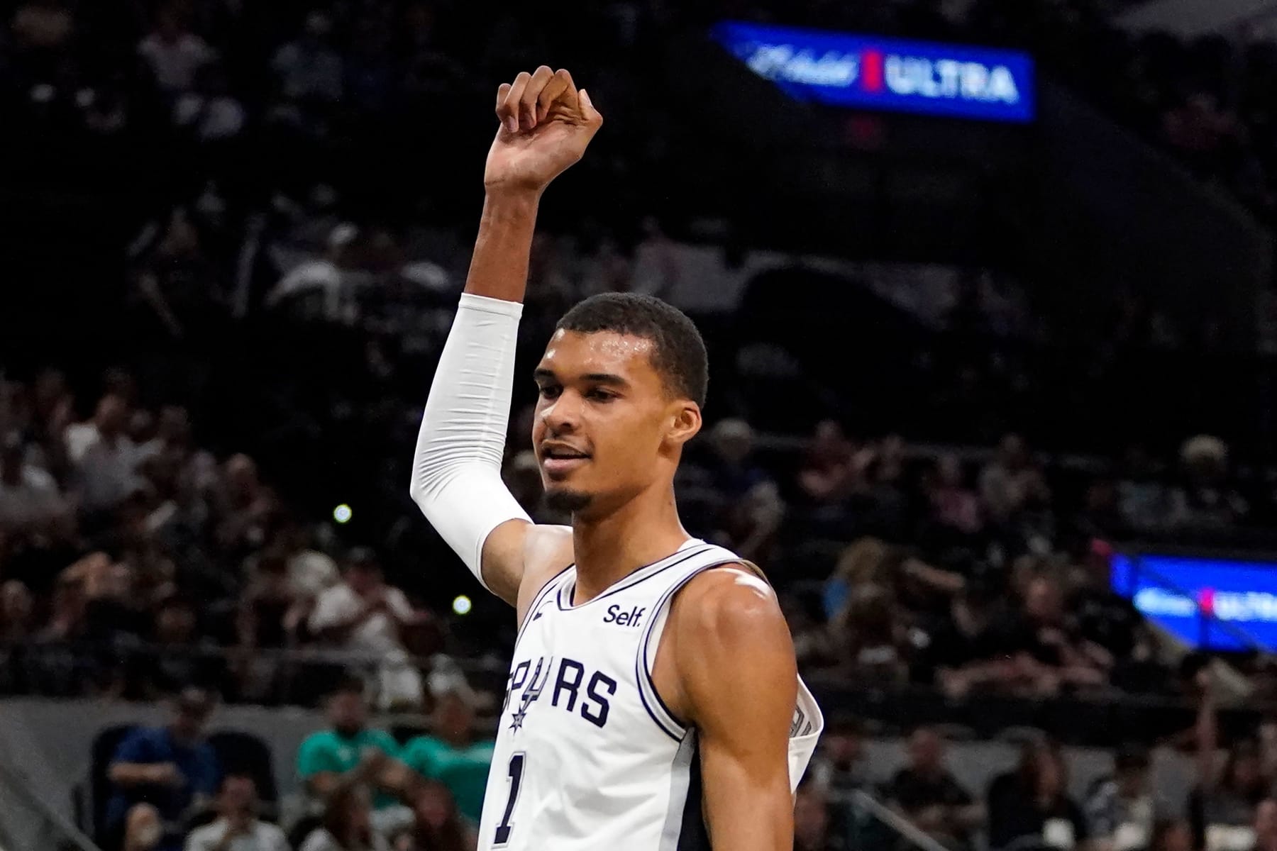 San Antonio Spurs' French forward #01 Victor Wembanyama celebrates after scoring during the NBA preseason game between the San Antonio Spurs and Miami Heat at the AT&T Center in San Antonio, Texas, on October 13, 2023. (Photo by TIMOTHY A. CLARY / AFP) (Photo by TIMOTHY A. CLARY/AFP via Getty Images)
