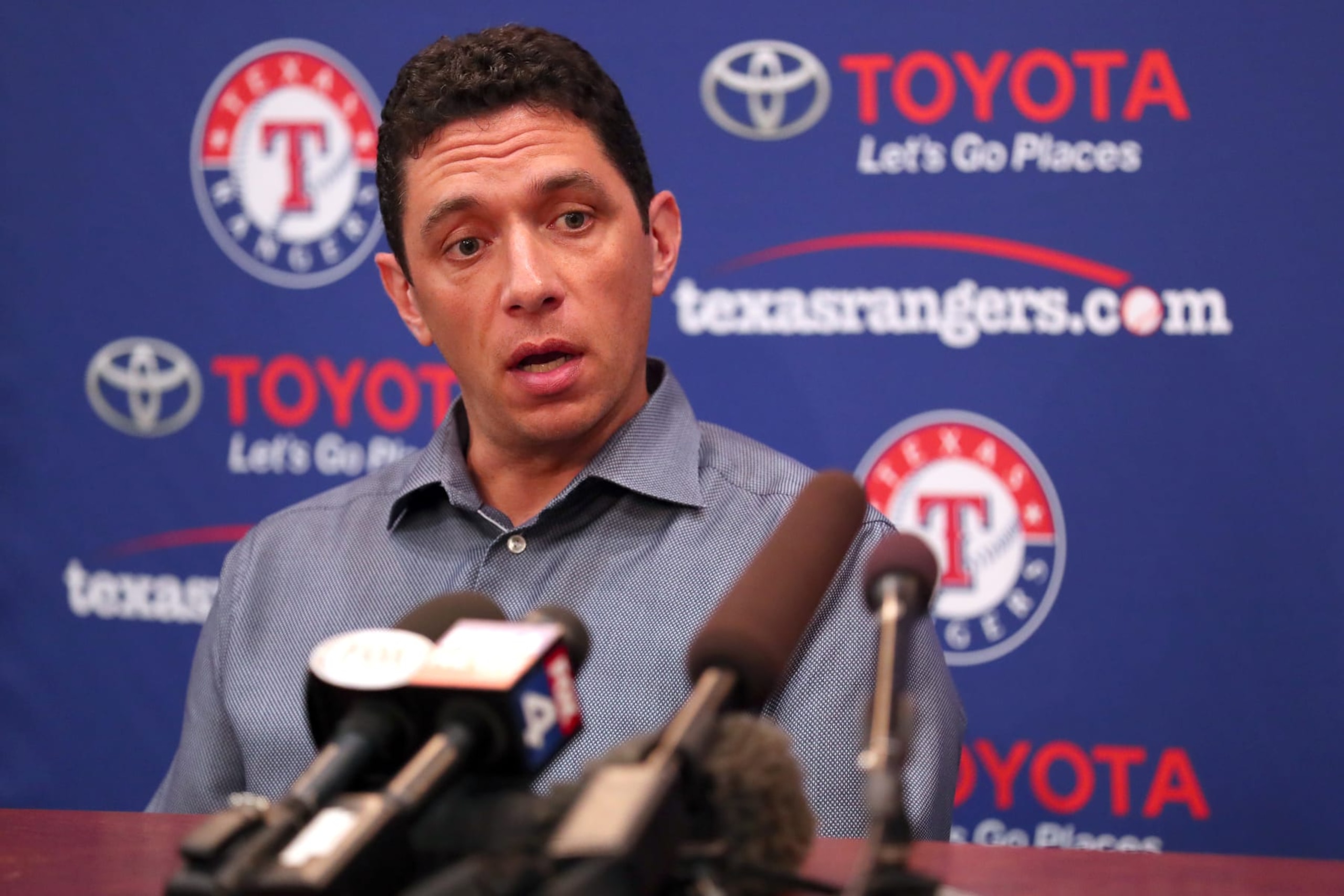 ARLINGTON, TEXAS - JULY 01: Texas Rangers General Manager Jon Daniels talks with the media following the announcement that the game between the Texas Rangers and the Los Angeles Angels has been postponed at Globe Life Park in Arlington on July 01, 2019 in Arlington, Texas. The game was postponed following an announcement made by the Los Angeles Angels that pitcher Tyler Skaggs had died. (Photo by Tom Pennington/Getty Images)