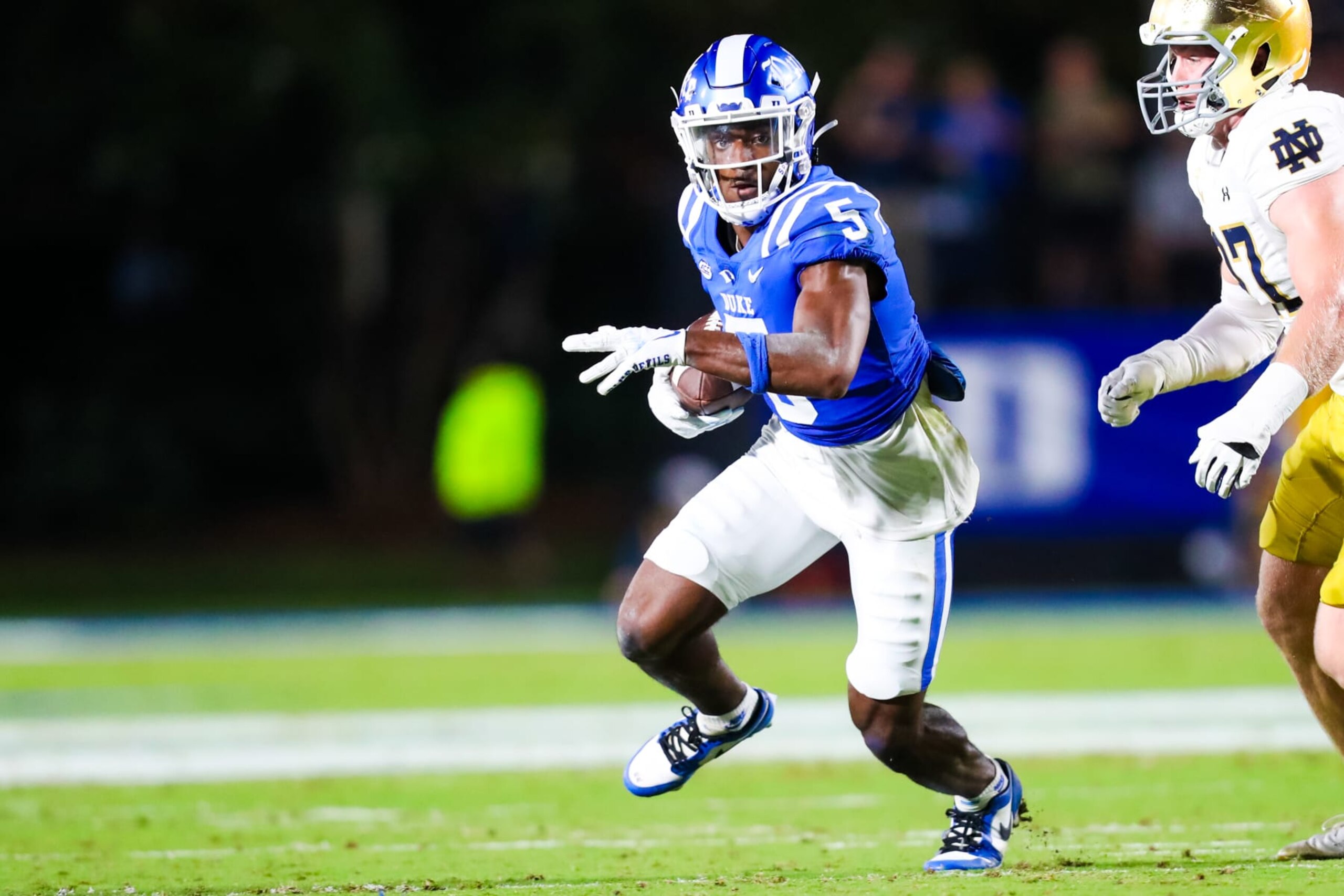 DURHAM, NC - SEPTEMBER 30: Jalon Calhoun (5) of the Duke Blue Devils runs the ball during a football game against the Notre Dame Fighting Irish at Wallace Wade Stadium in Durham, North Carolina on Sep 30, 2023. (Photo by David Jensen/Icon Sportswire via Getty Images)
