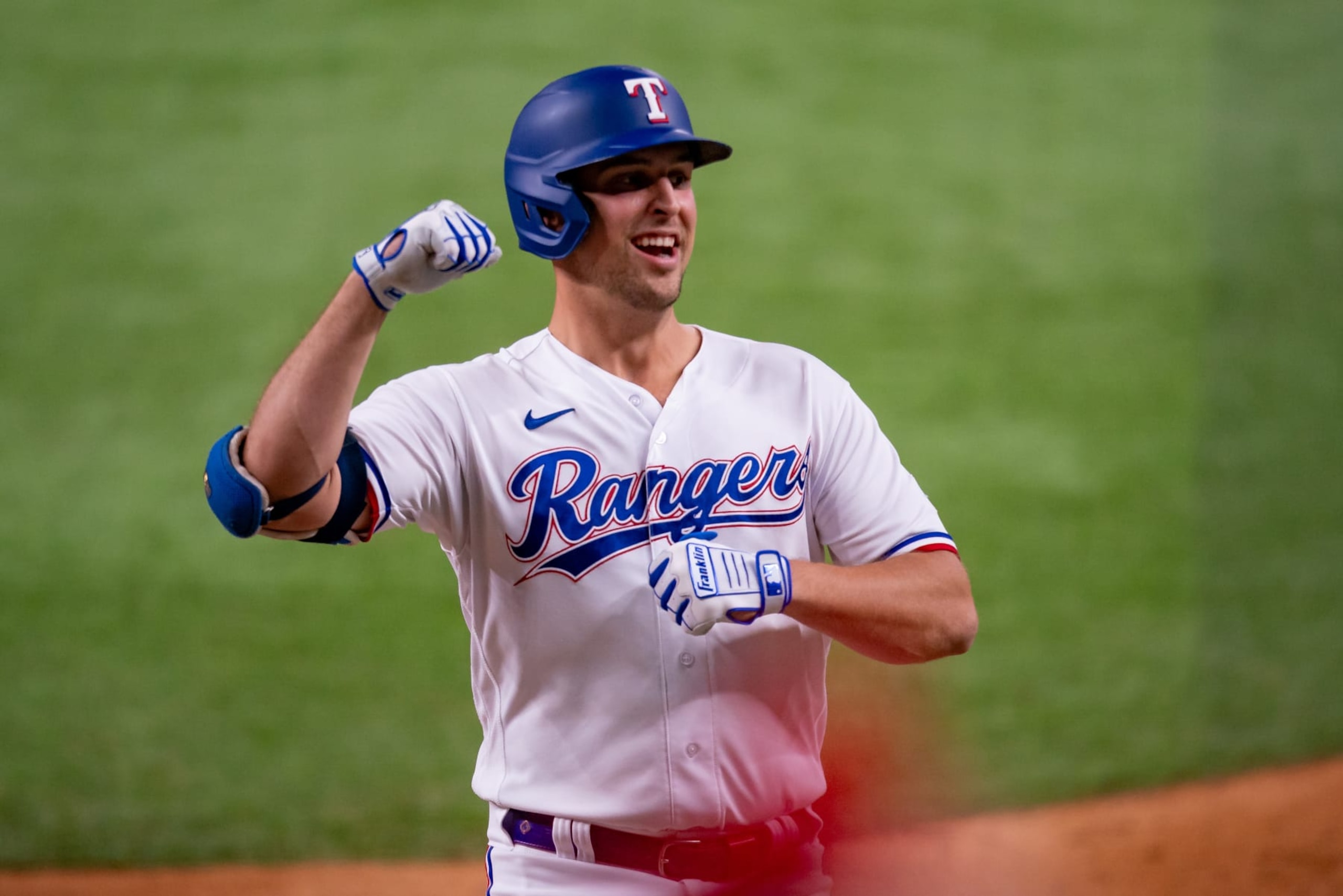 ARLINGTON, TX - OCTOBER 10: Texas Rangers first baseman Nathaniel Lowe (30) celebrates a home run during game 3 of the ALDS between the Baltimore Orioles and the Texas Rangers on October 10, 2023, at Globe Life Field in Arlington, TX. (Photo by Chris Leduc/Icon Sportswire via Getty Images)