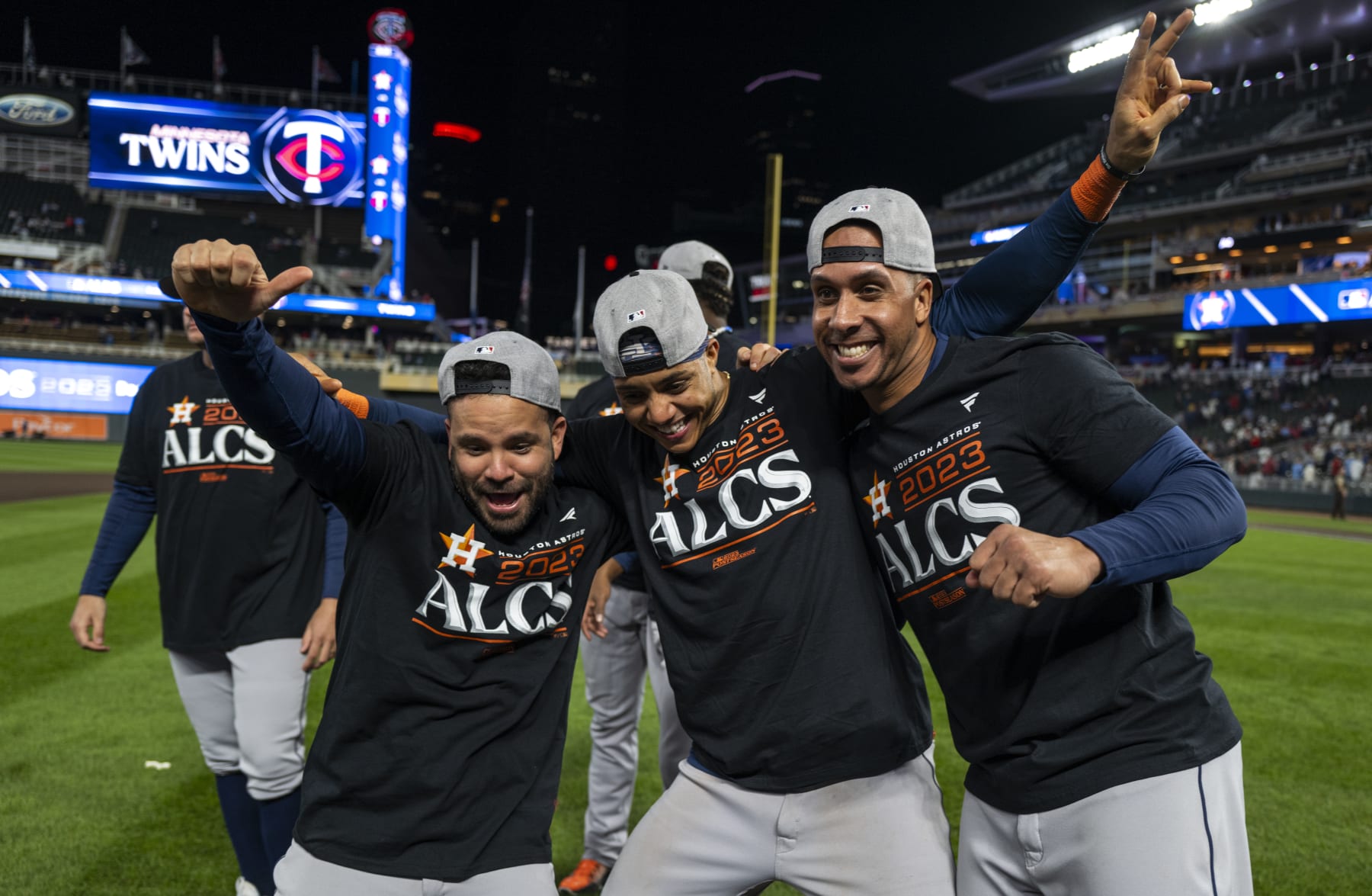 MINNEAPOLIS, MINNESOTA - OCTOBER 11: (L-R) Jose Altuve #27 of the Houston Astros celebrates with Jeremy Pena #3 and Michael Brantley #23 after the victory against the Minnesota Twins in Game Four of the Division Series at Target Field on October 11, 2023 in Minneapolis, Minnesota. . (Photo by Stephen Maturen/Getty Images)