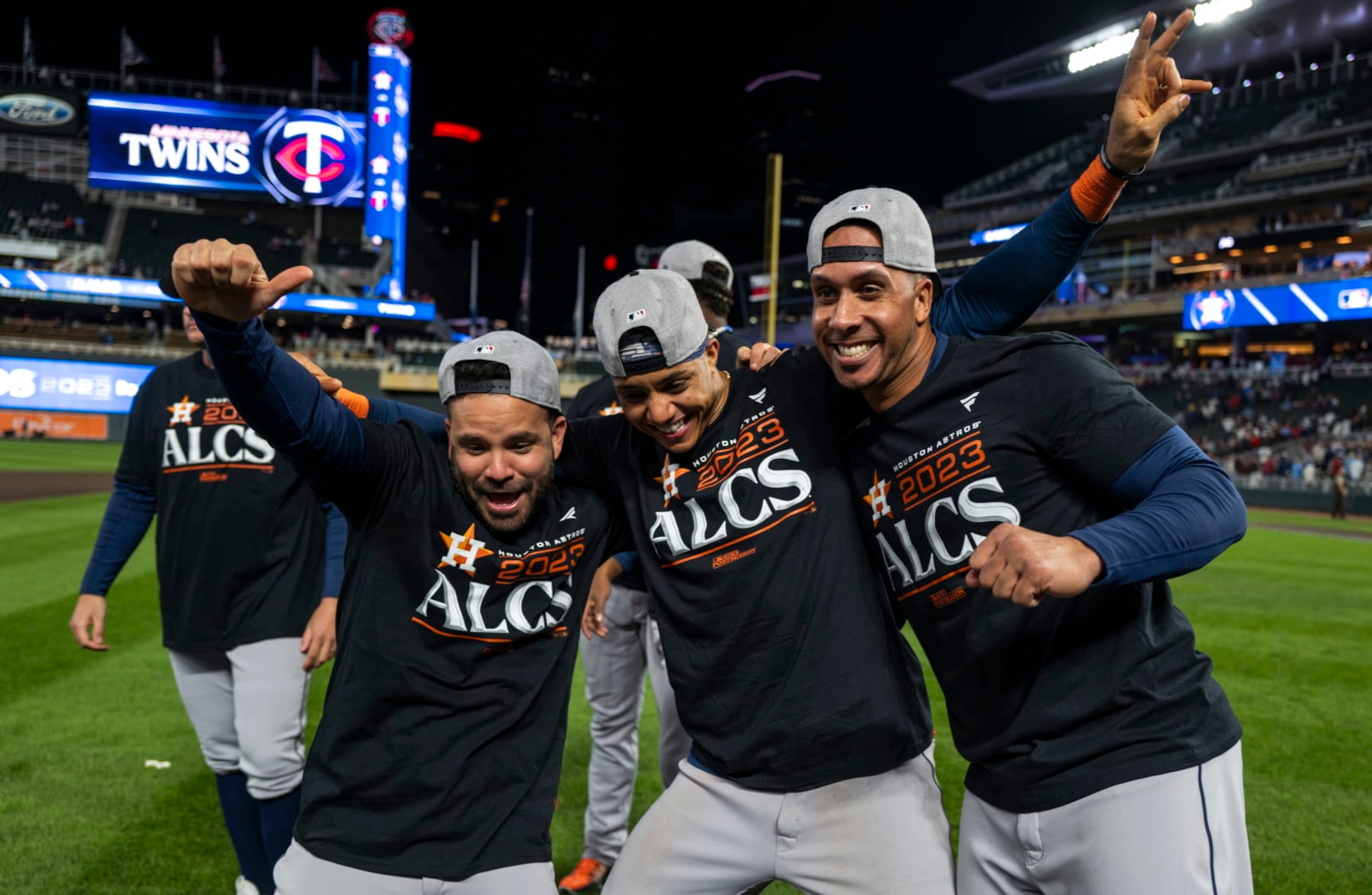 MINNEAPOLIS, MINNESOTA - OCTOBER 11: (L-R) Jose Altuve #27 of the Houston Astros celebrates with Jeremy Pena #3 and Michael Brantley #23 after the victory against the Minnesota Twins in Game Four of the Division Series at Target Field on October 11, 2023 in Minneapolis, Minnesota. . (Photo by Stephen Maturen/Getty Images)