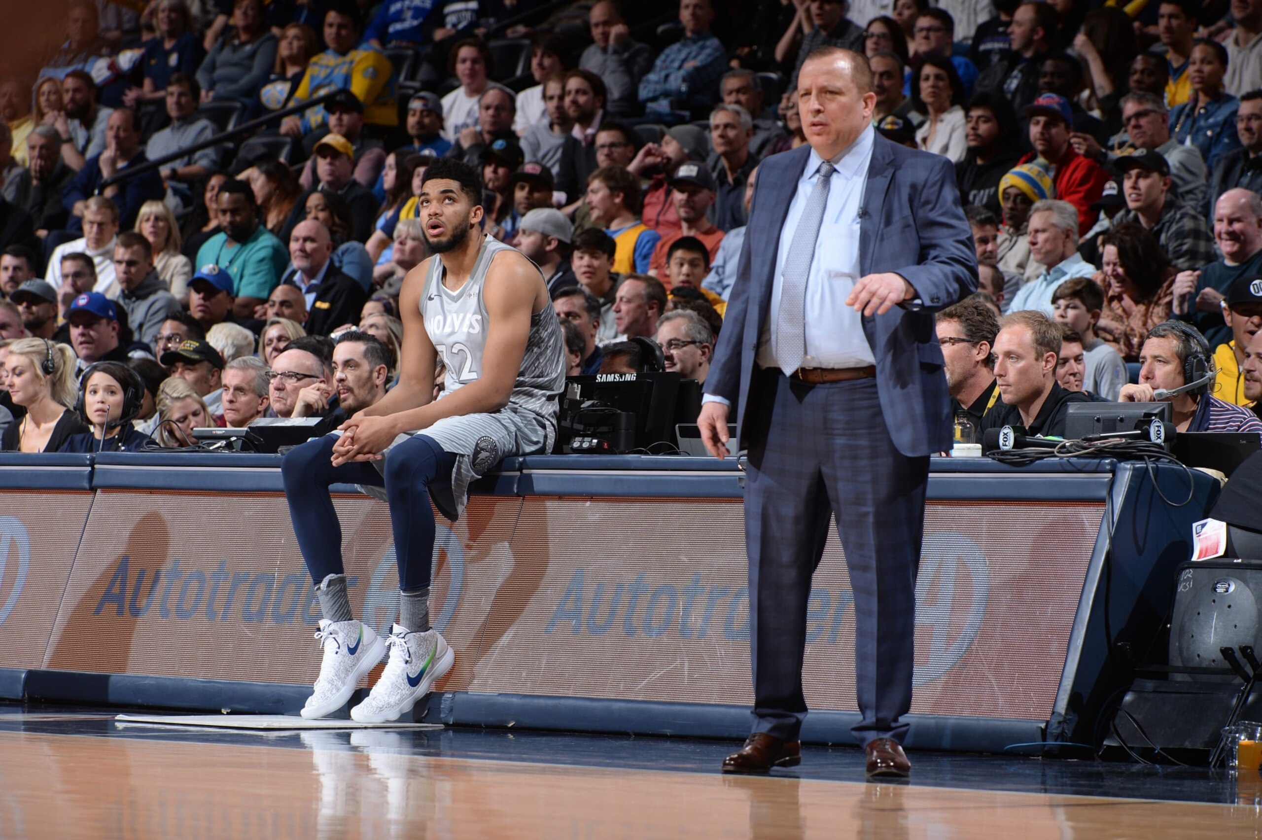 DENVER, CO - APRIL 5:  Tom Thibodeau and Karl-Anthony Towns #32 of the Minnesota Timberwolves look on during the game against the Denver Nuggets on April 5, 2018 at the Pepsi Center in Denver, Colorado. NOTE TO USER: User expressly acknowledges and agrees that, by downloading and/or using this Photograph, user is consenting to the terms and conditions of the Getty Images License Agreement. Mandatory Copyright Notice: Copyright 2018 NBAE (Photo by Bart Young/NBAE via Getty Images)