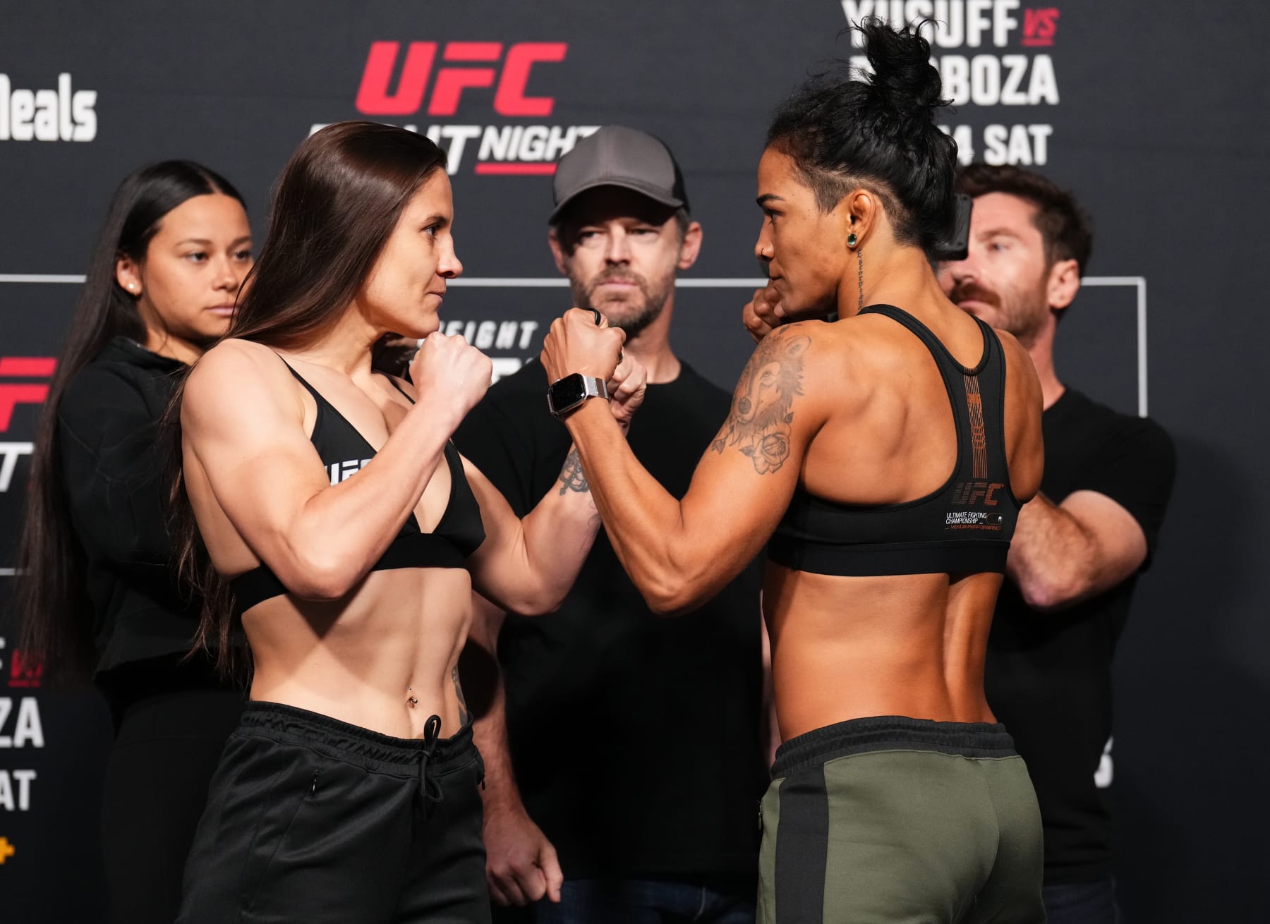 Jennifer Maia (left) and Viviane Araujo square off before their flyweight fight. 