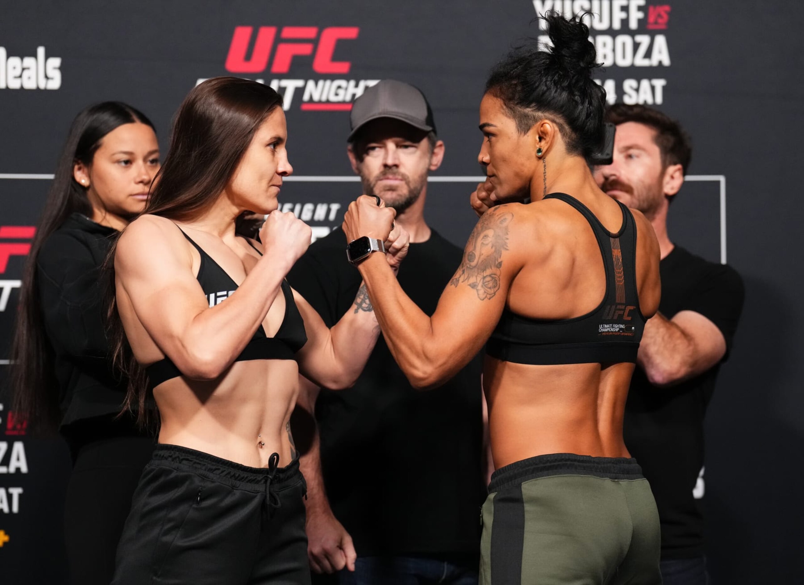 Jennifer Maia (left) and Viviane Araujo square off before their flyweight fight. 