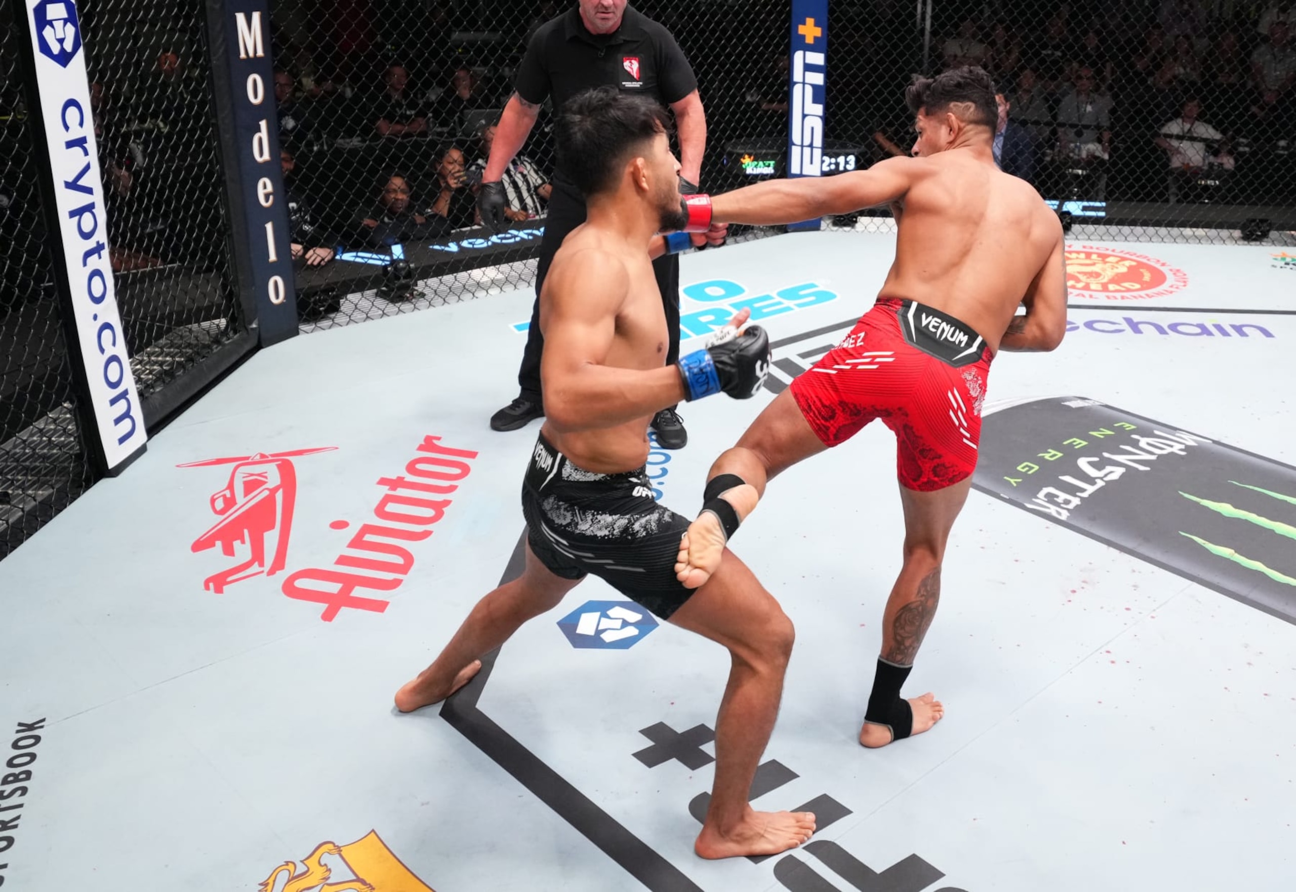 LAS VEGAS, NEVADA - OCTOBER 14: (L-R) Adrian Yanez battles Jonathan Martinez in a bantamweight fight during the UFC Fight Night event at UFC APEX on October 14, 2023 in Las Vegas, Nevada. (Photo by Chris Unger/Zuffa LLC via Getty Images)