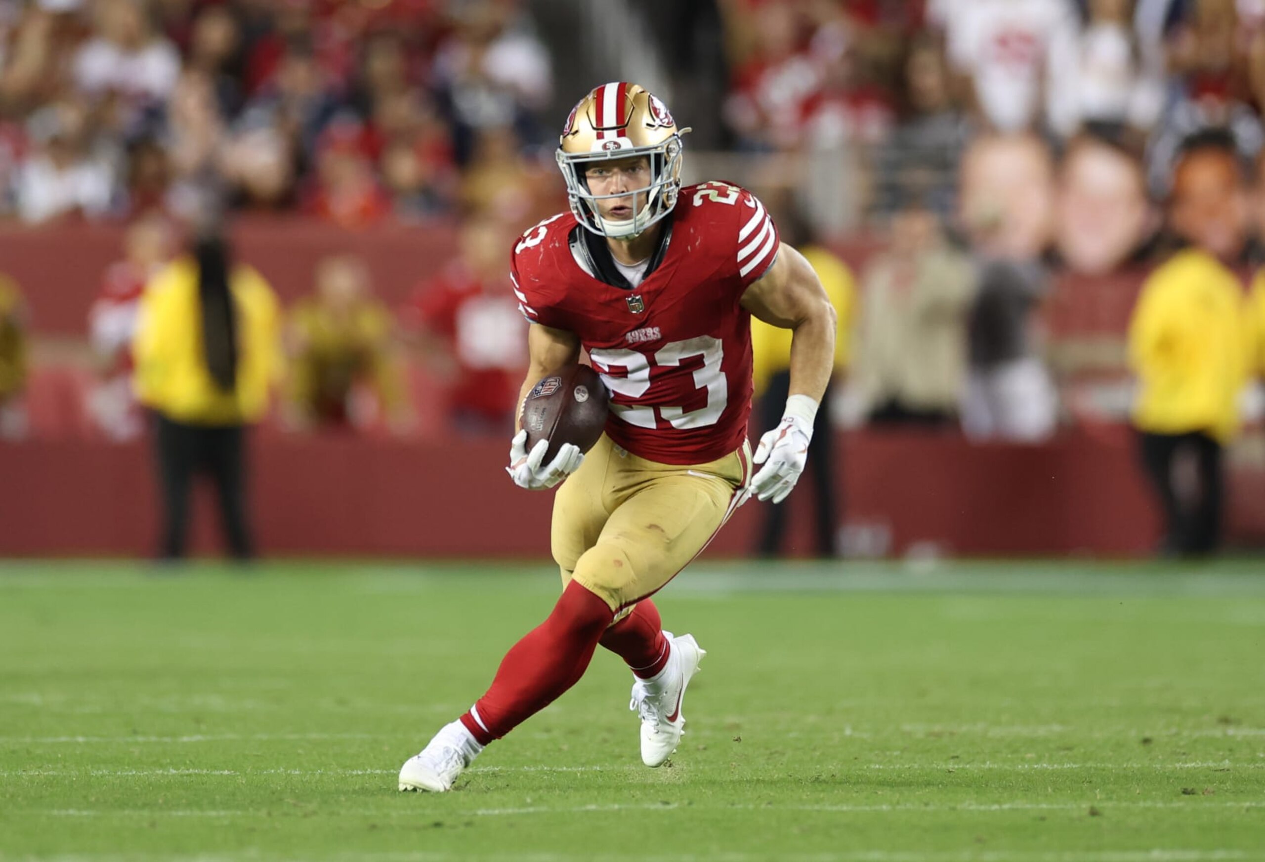 SANTA CLARA, CALIFORNIA - OCTOBER 08: Christian McCaffrey #23 of the San Francisco 49ers rushes during the third quarter against the Dallas Cowboys at Levi's Stadium on October 08, 2023 in Santa Clara, California. (Photo by Ezra Shaw/Getty Images)