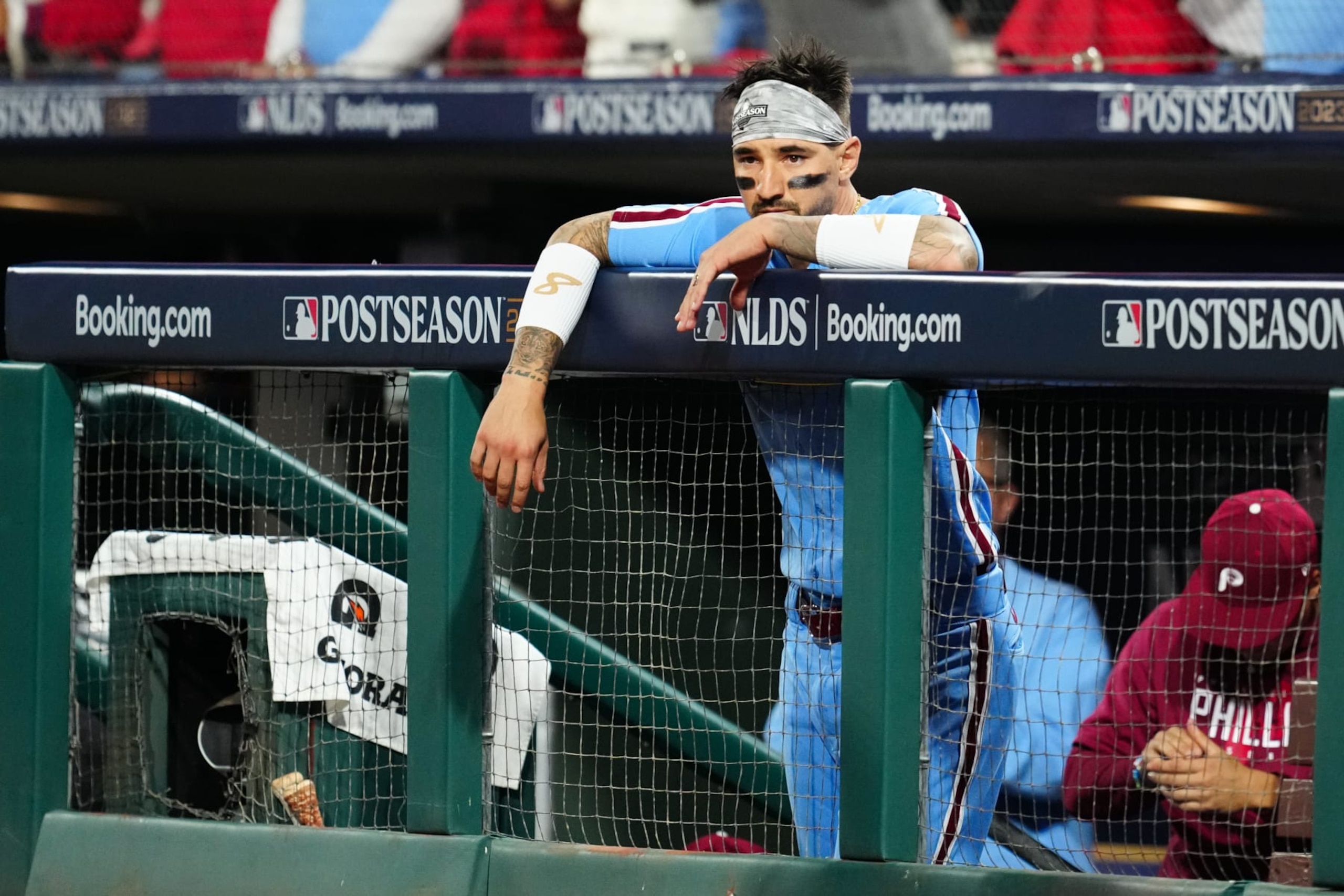 PHILADELPHIA, PA - OCTOBER 12:   Nick Castellanos #8 of the Philadelphia Phillies looks on from the dugout after hitting a solo home run in the sixth inning during Game 4 of the Division Series between the Atlanta Braves and the Philadelphia Phillies at Citizens Bank Park on Thursday, October 12, 2023 in Philadelphia, Pennsylvania. (Photo by Mary DeCicco/MLB Photos via Getty Images)