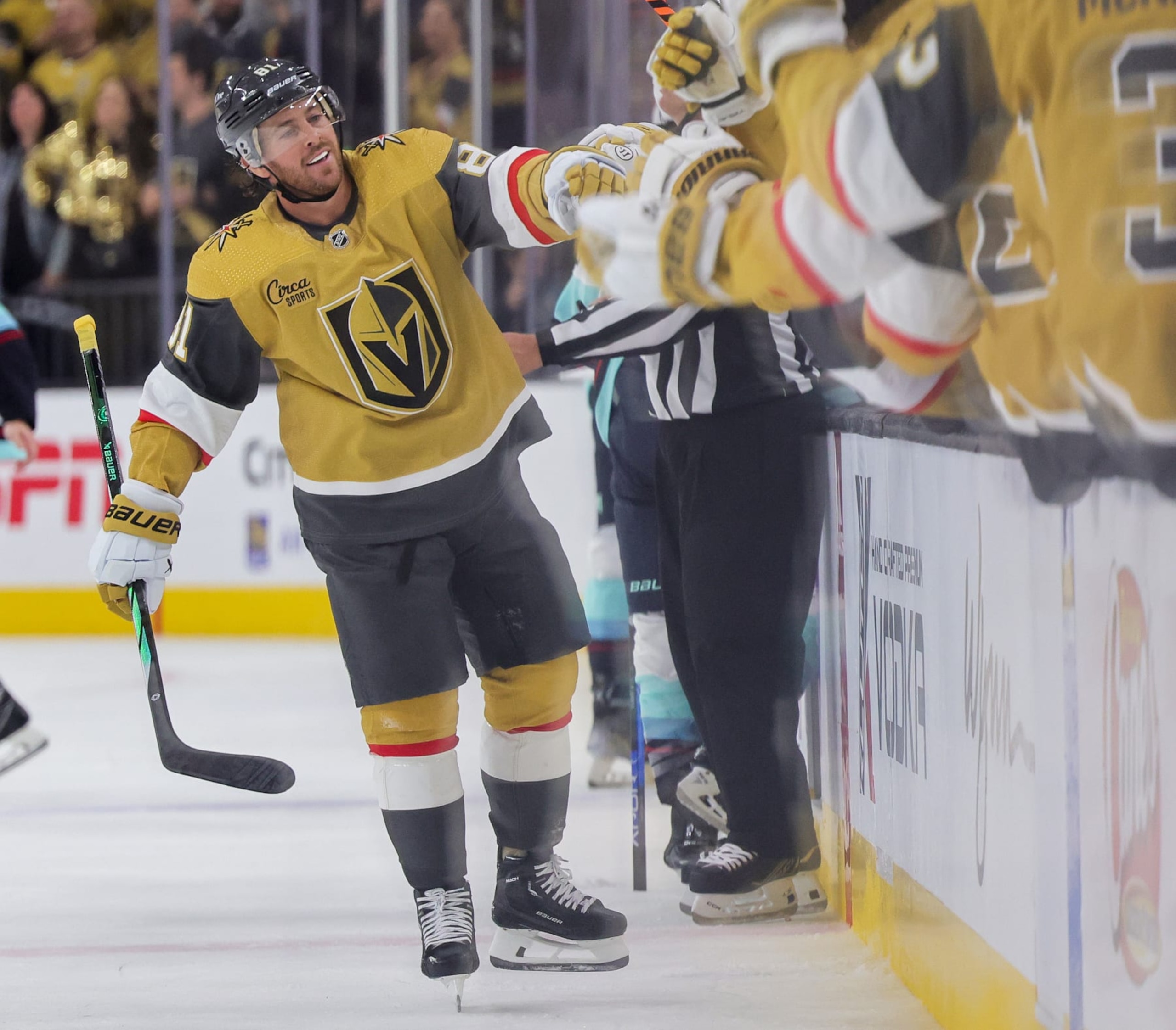 LAS VEGAS, NEVADA - OCTOBER 10: Jonathan Marchessault #81 of the Vegas Golden Knights celebrates with teammates on the bench after scoring a first-period goal against the Seattle Kraken during their game at T-Mobile Arena on October 10, 2023 in Las Vegas, Nevada. The Golden Knights defeated the Kraken 4-1. (Photo by Ethan Miller/Getty Images) LAS VEGAS, NEVADA - OCTOBER 10: Jonathan Marchessault #81 of the Vegas Golden Knights celebrates with teammates on the bench after scoring a first-period goal against the Seattle Kraken during their game at T-Mobile Arena on October 10, 2023 in Las Vegas, Nevada. The Golden Knights defeated the Kraken 4-1. (Photo by Ethan Miller/Getty Images)