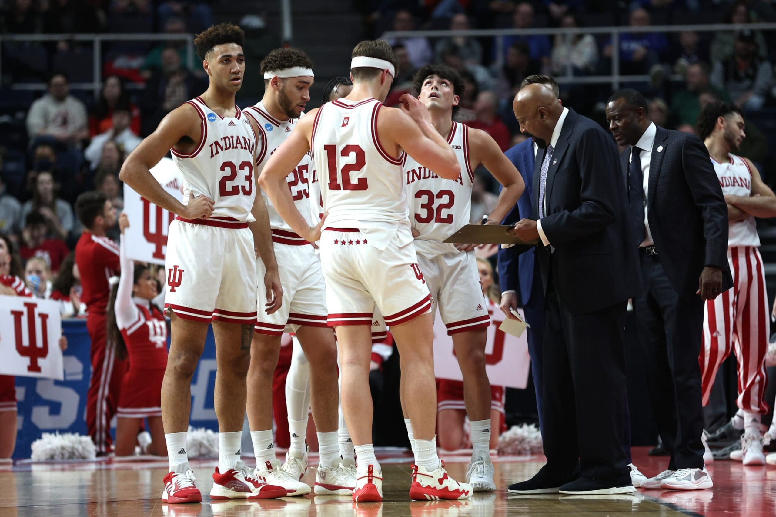 ALBANY, NEW YORK - MARCH 17: Head coach Mike Woodson of the Indiana Hoosiers speaks to his team in the first half against the Kent State Golden Flashes during the first round of the NCAA Men's Basketball Tournament at MVP Arena on March 17, 2023 in Albany, New York. (Photo by Rob Carr/Getty Images) ALBANY, NEW YORK - MARCH 17: Head coach Mike Woodson of the Indiana Hoosiers speaks to his team in the first half against the Kent State Golden Flashes during the first round of the NCAA Men's Basketball Tournament at MVP Arena on March 17, 2023 in Albany, New York. (Photo by Rob Carr/Getty Images)