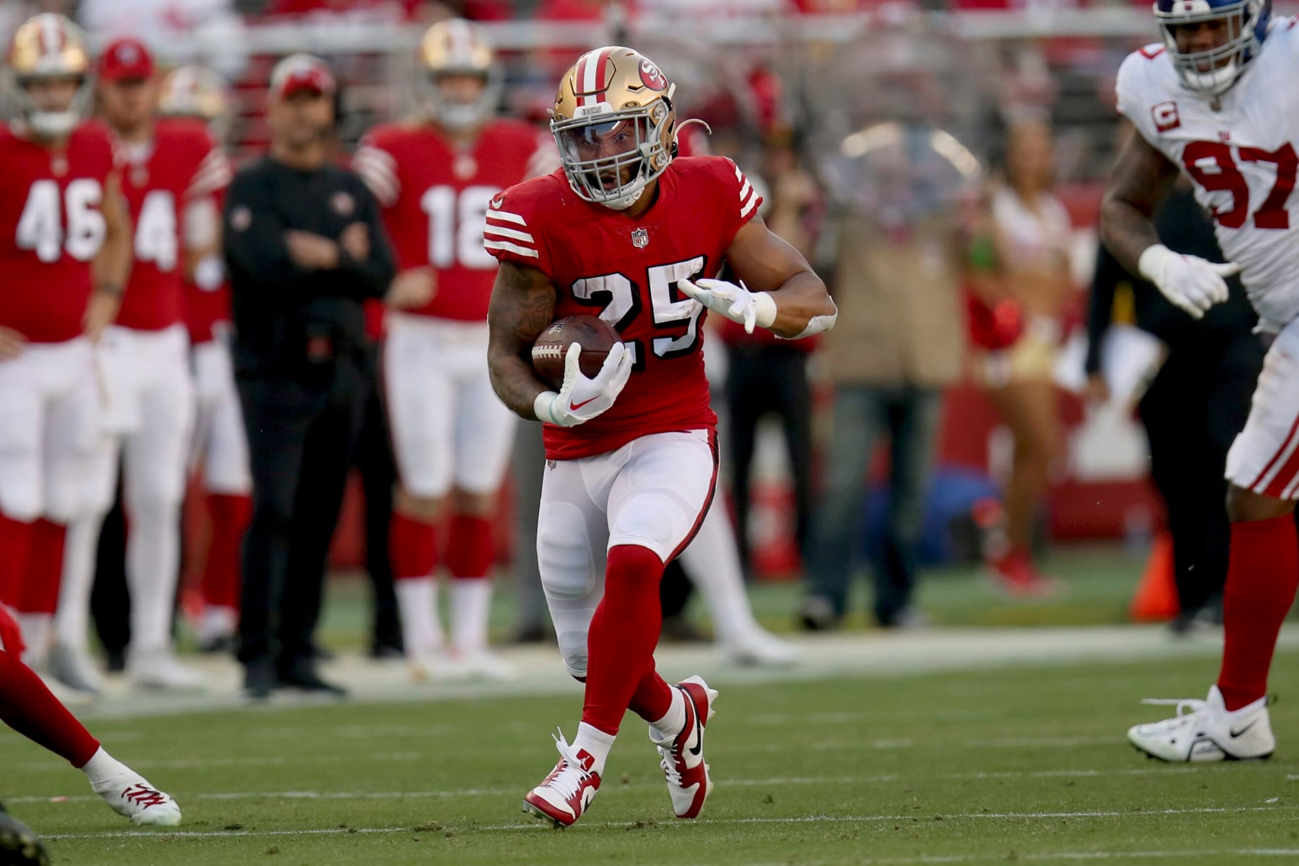 San Francisco 49ers running back Elijah Mitchell (25) runs during an NFL football game against the New York Giants, Thursday, Sept. 21, 2023, in Santa Clara, Calif. (AP Photo/Scot Tucker)