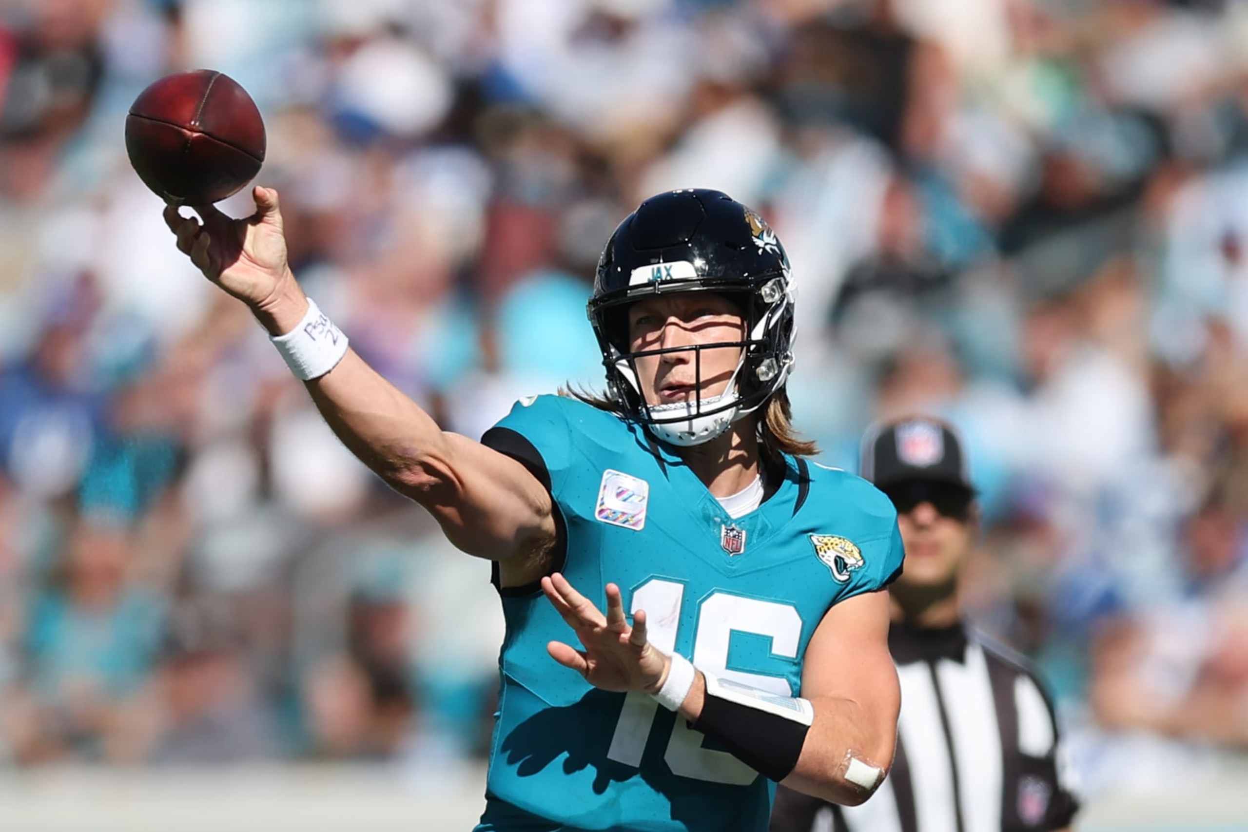 JACKSONVILLE, FLORIDA - OCTOBER 15: Trevor Lawrence #16 of the Jacksonville Jaguars throws a pass during the third quarter against the Indianapolis Colts at EverBank Stadium on October 15, 2023 in Jacksonville, Florida. (Photo by Mike Carlson/Getty Images)