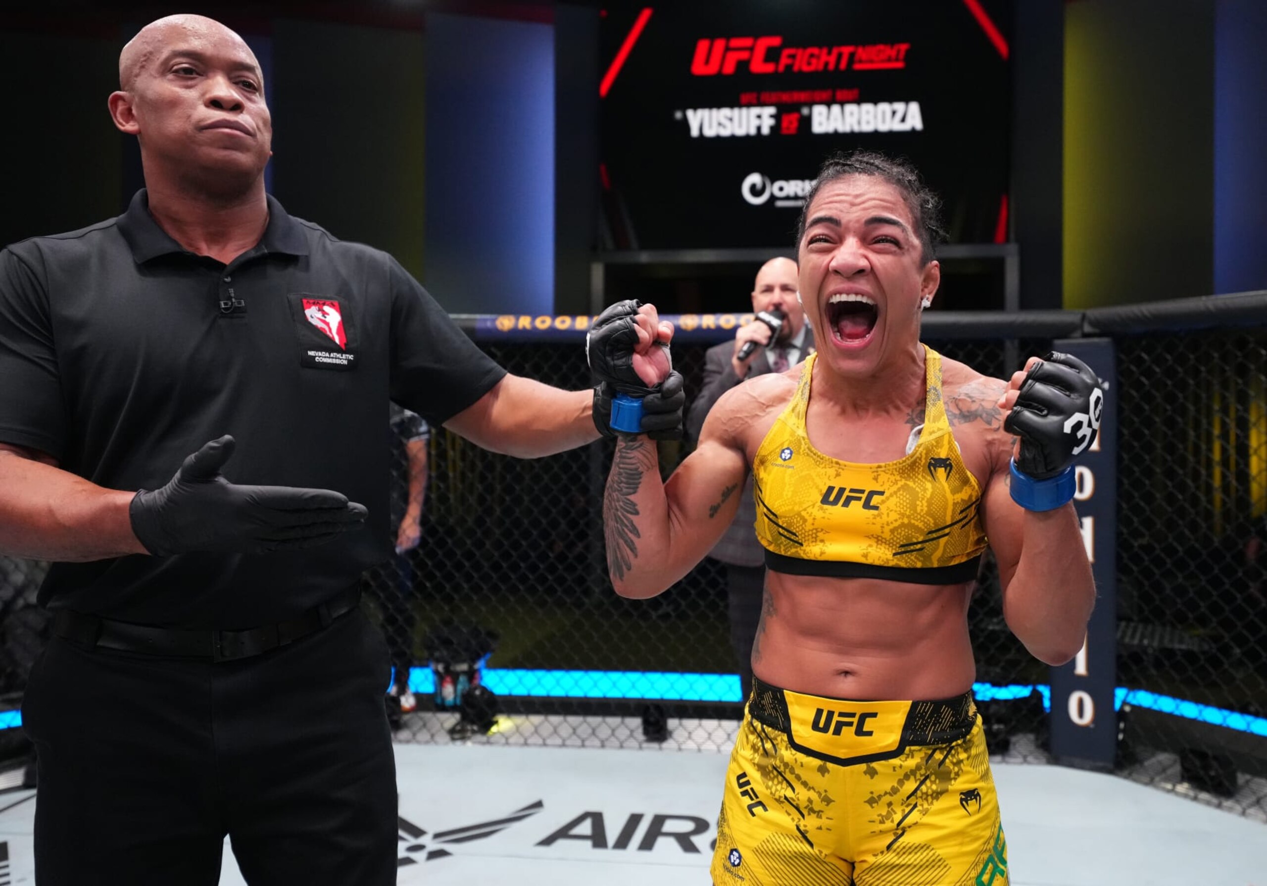 LAS VEGAS, NEVADA - OCTOBER 14: Viviane Araujo of Brazil reacts after her victory against Jennifer Maia of Brazil in a flyweight fight during the UFC Fight Night event at UFC APEX on October 14, 2023 in Las Vegas, Nevada. (Photo by Chris Unger/Zuffa LLC via Getty Images) LAS VEGAS, NEVADA - OCTOBER 14: Viviane Araujo of Brazil reacts after her victory against Jennifer Maia of Brazil in a flyweight fight during the UFC Fight Night event at UFC APEX on October 14, 2023 in Las Vegas, Nevada. (Photo by Chris Unger/Zuffa LLC via Getty Images)