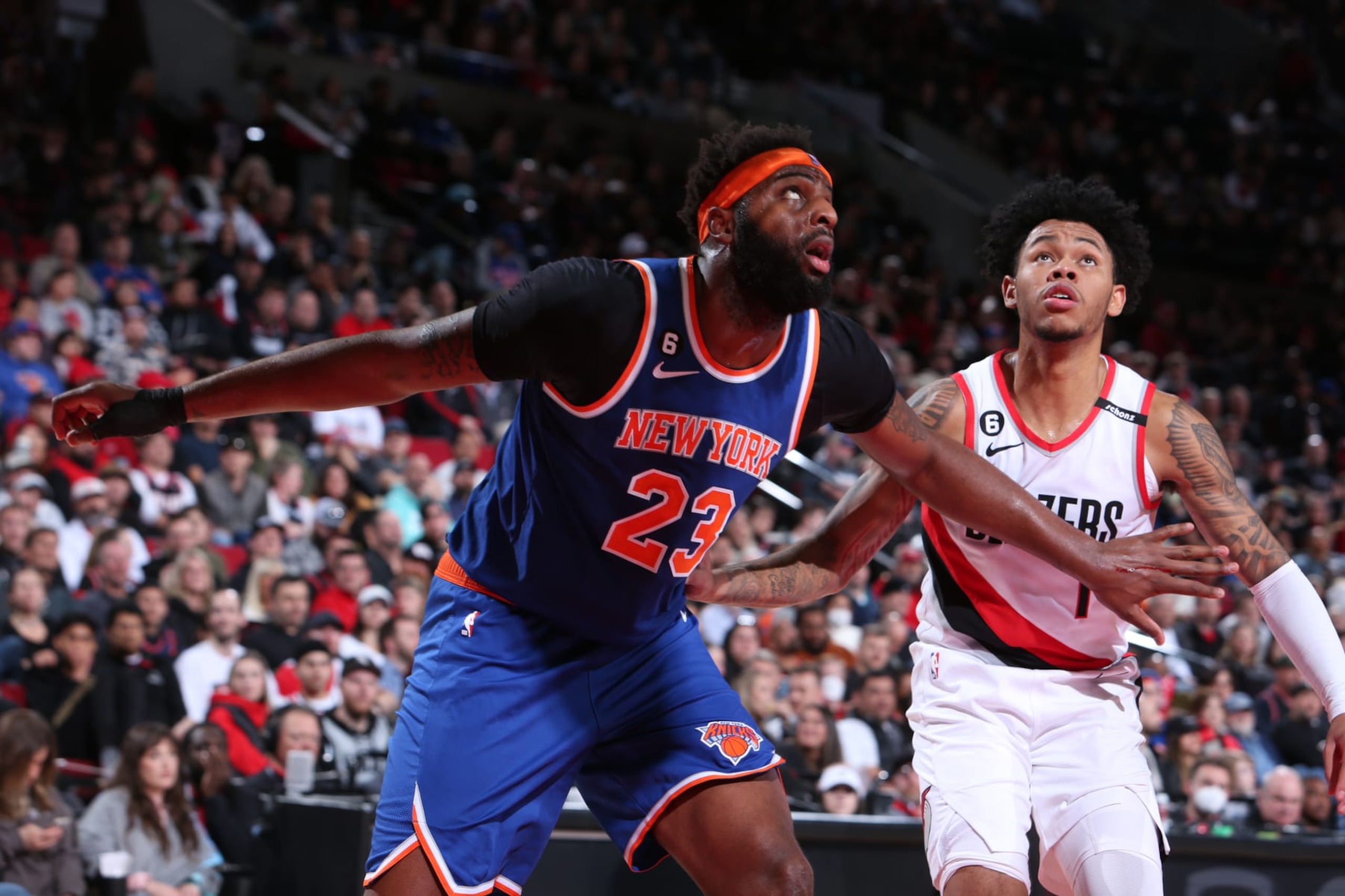 PORTLAND, OR - MARCH 14:  Mitchell Robinson #23 of the New York Knicks boxes out during the game  on March 14, 2023 at the Moda Center Arena in Portland, Oregon. NOTE TO USER: User expressly acknowledges and agrees that, by downloading and or using this photograph, user is consenting to the terms and conditions of the Getty Images License Agreement. Mandatory Copyright Notice: Copyright 2023 NBAE (Photo by Sam Forencich/NBAE via Getty Images)
