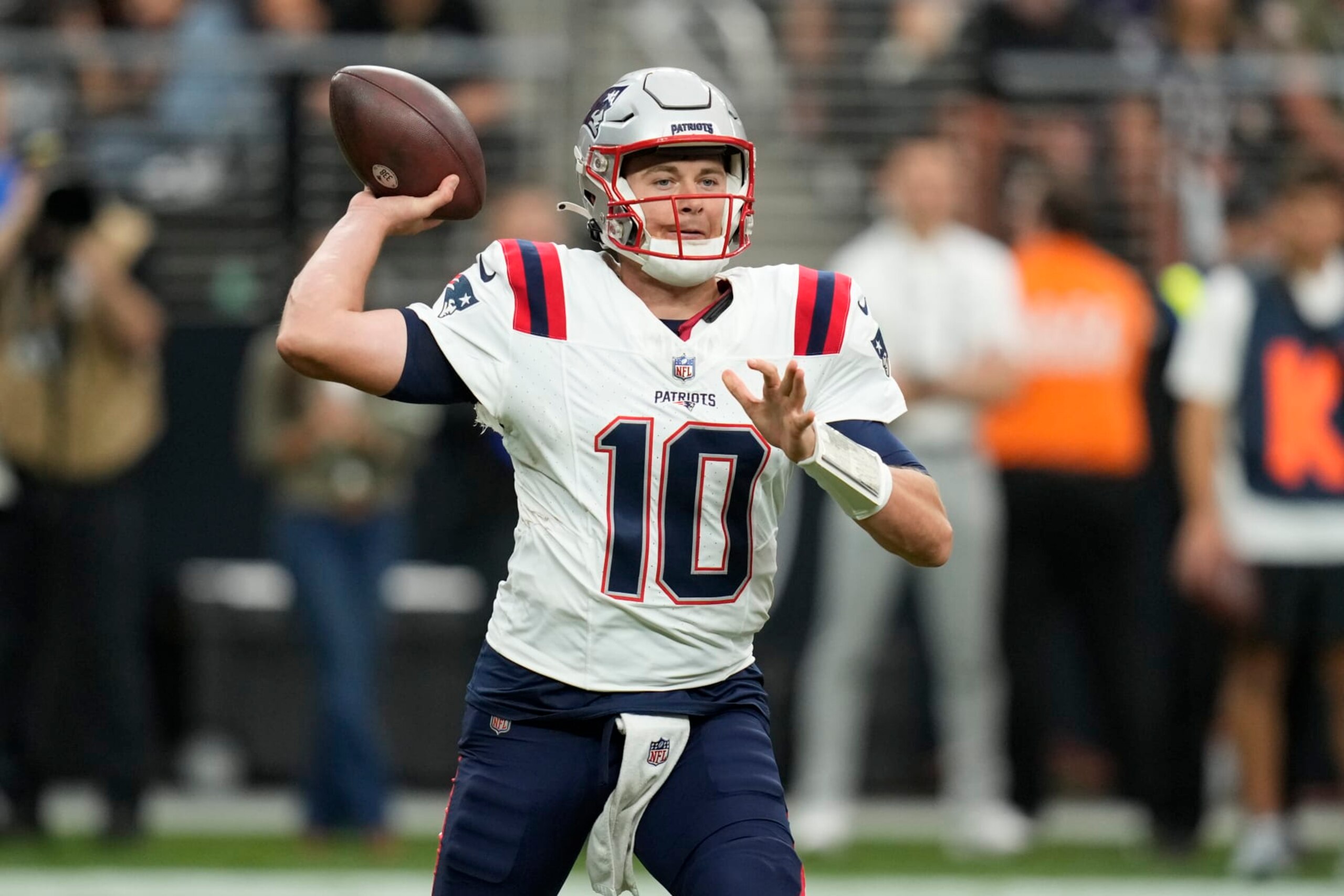 New England Patriots quarterback Mac Jones throws a pass during the first half of an NFL football game against the Las Vegas Raiders, Sunday, Oct. 15, 2023, in Las Vegas. (AP Photo/John Locher)