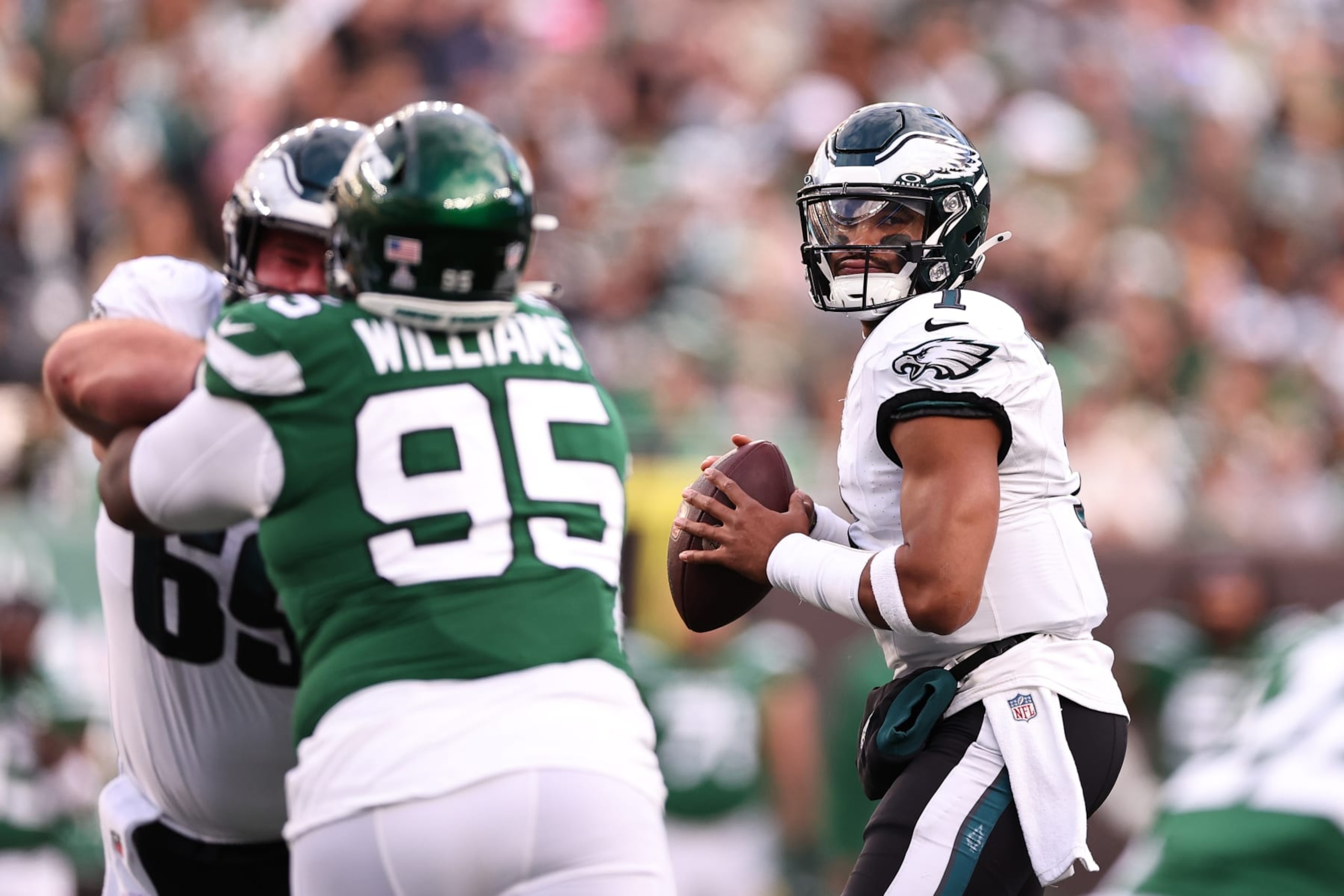 EAST RUTHERFORD, NEW JERSEY - OCTOBER 15: Jalen Hurts #1 of the Philadelphia Eagles looks to pass during the first half in the game against the New York Jets at MetLife Stadium on October 15, 2023 in East Rutherford, New Jersey. (Photo by Dustin Satloff/Getty Images)