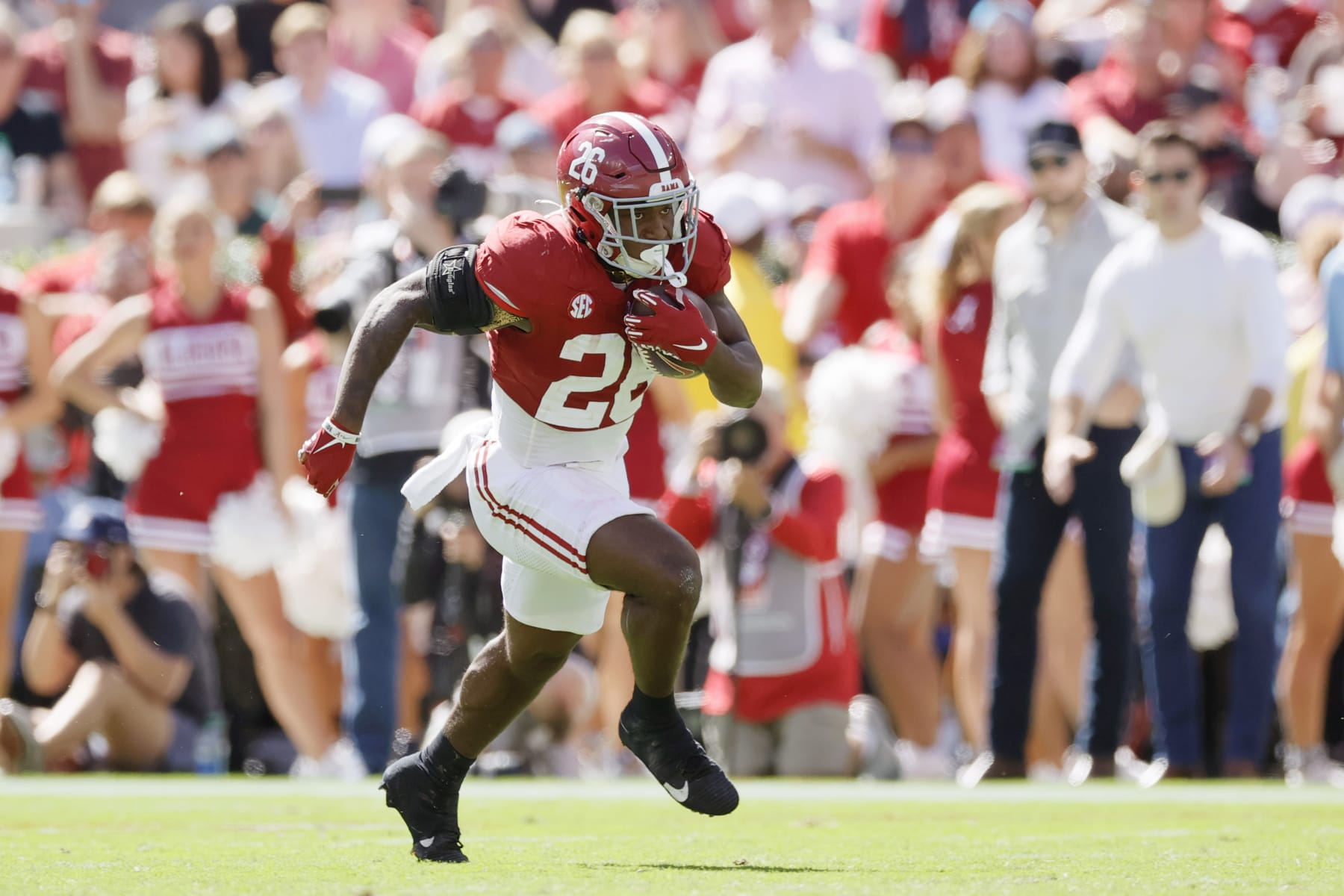 TUSCALOOSA, ALABAMA - OCTOBER 14: Jam Miller #26 of the Alabama Crimson Tide runs the ball against the Arkansas Razorbacks during the third quarter at Bryant-Denny Stadium on October 14, 2023 in Tuscaloosa, Alabama. (Photo by Alex Slitz/Getty Images)