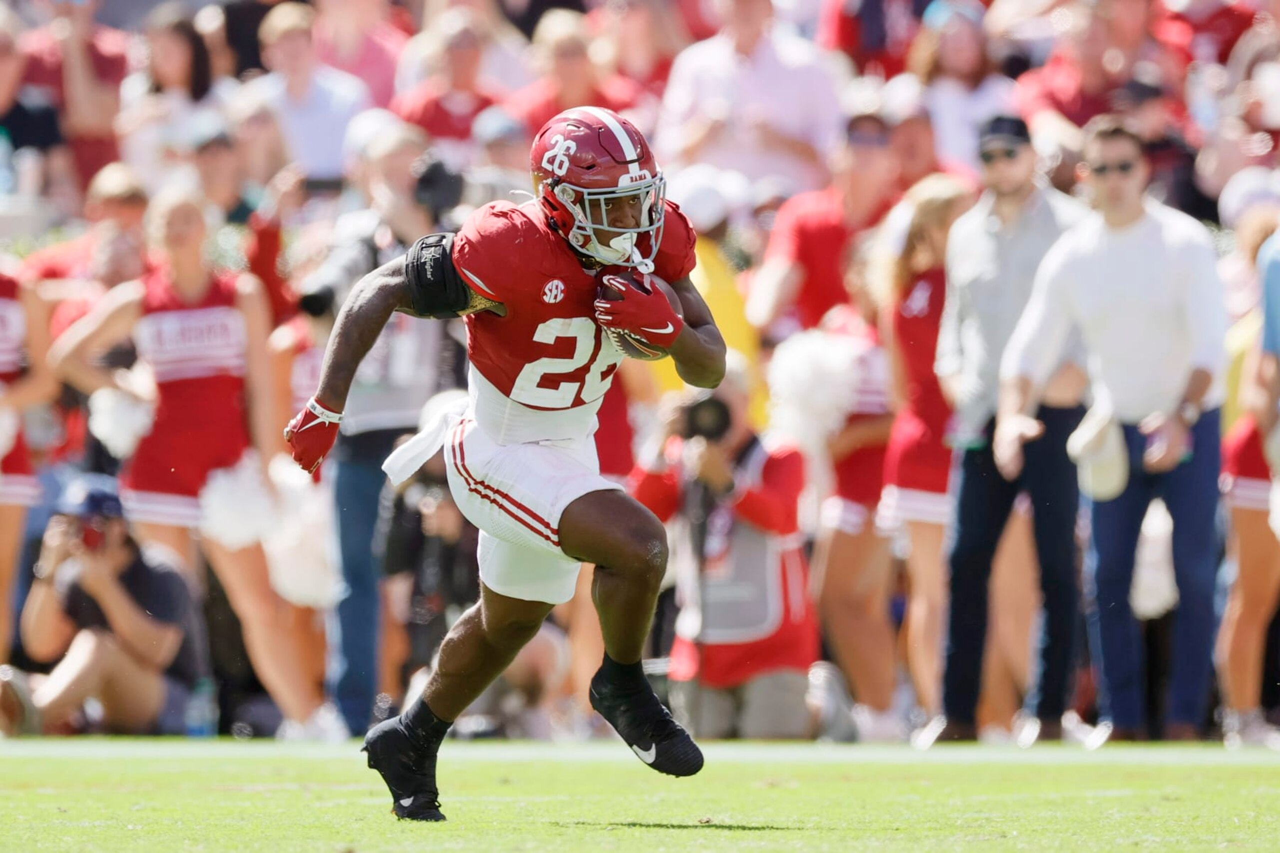 TUSCALOOSA, ALABAMA - OCTOBER 14: Jam Miller #26 of the Alabama Crimson Tide runs the ball against the Arkansas Razorbacks during the third quarter at Bryant-Denny Stadium on October 14, 2023 in Tuscaloosa, Alabama. (Photo by Alex Slitz/Getty Images)