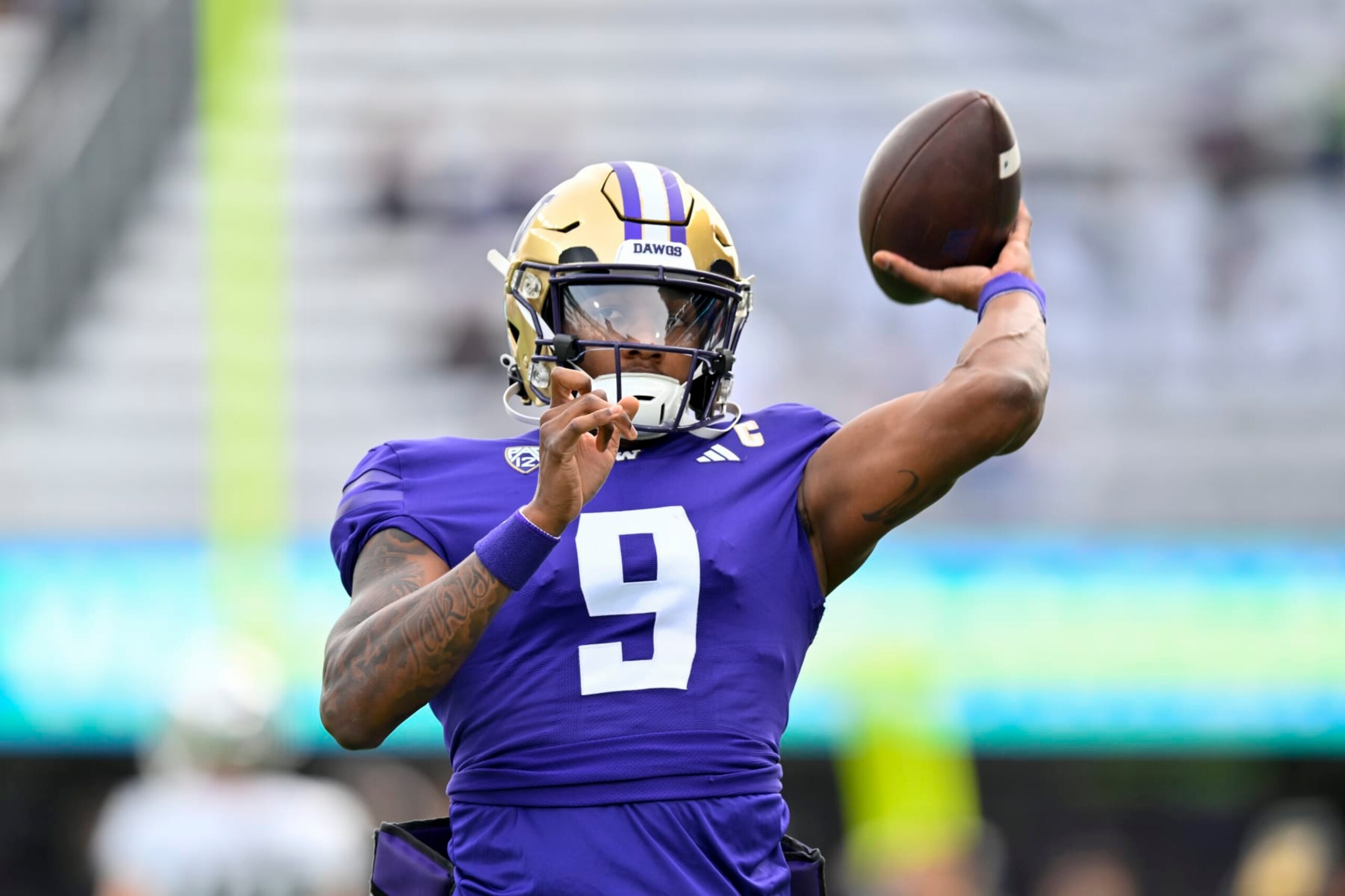 SEATTLE, WASHINGTON - OCTOBER 14: Michael Penix Jr. #9 of the Washington Huskies warms up before the game against the Oregon Ducks at Husky Stadium on October 14, 2023 in Seattle, Washington. (Photo by Alika Jenner/Getty Images)