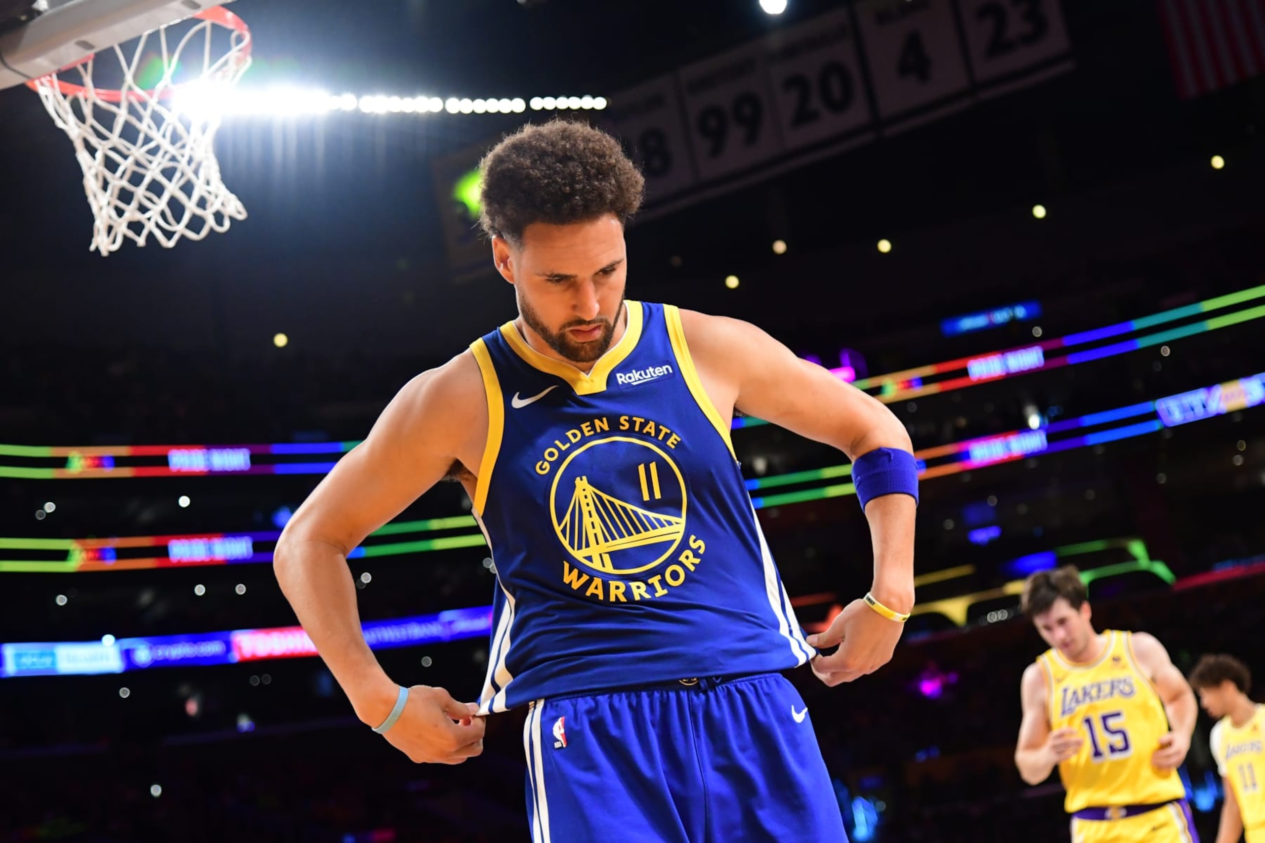 LOS ANGELES, CA - OCTOBER 13: Klay Thompson #11 of the Golden State Warriors looks on during the game against the Los Angeles Lakers on October 13, 2023 at Crypto.Com Arena in Los Angeles, California. NOTE TO USER: User expressly acknowledges and agrees that, by downloading and/or using this Photograph, user is consenting to the terms and conditions of the Getty Images License Agreement. Mandatory Copyright Notice: Copyright 2023 NBAE (Photo by Adam Pantozzi/NBAE via Getty Images)