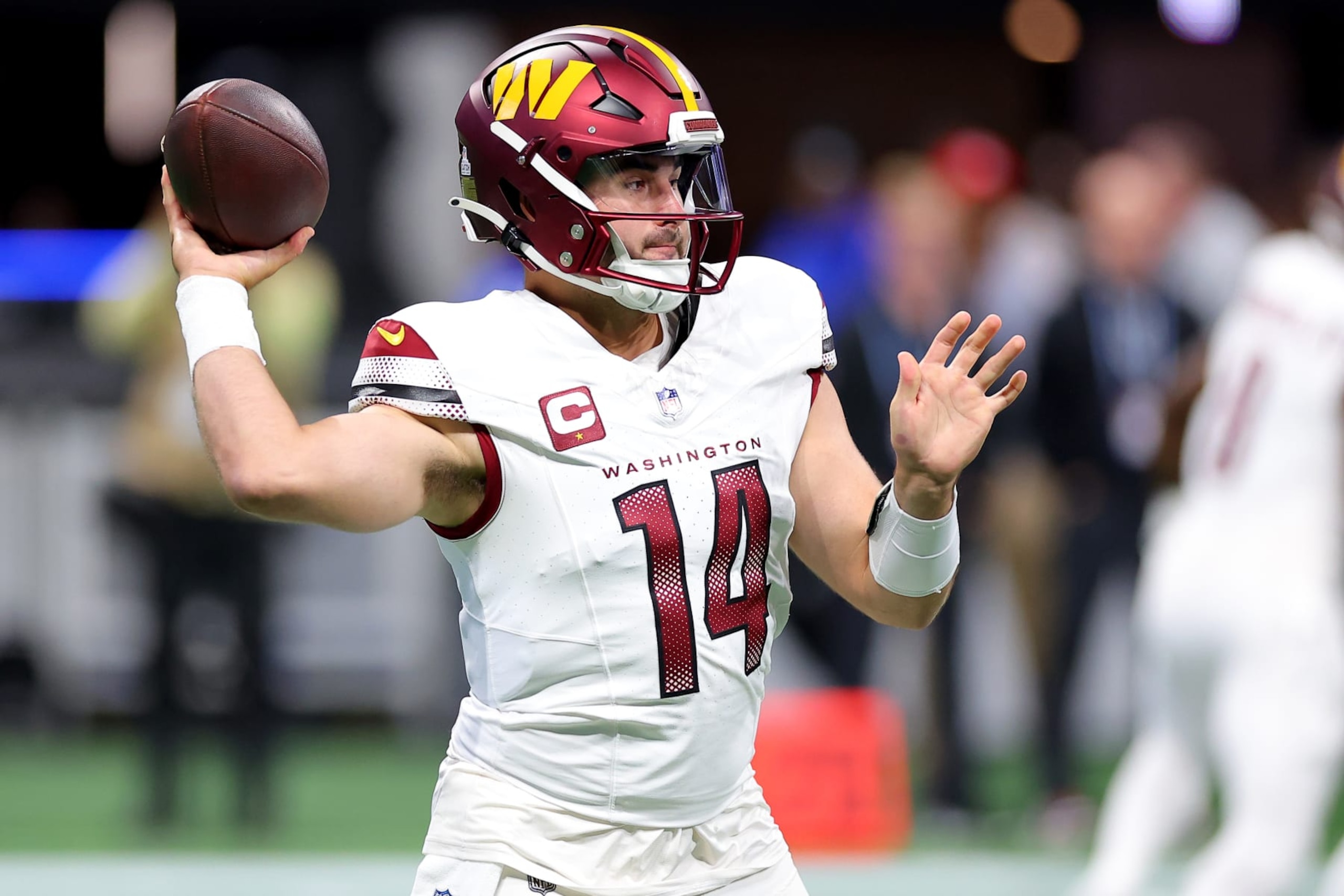 ATLANTA, GEORGIA - OCTOBER 15: Sam Howell #14 of the Washington Commanders attempts a pass during the first quarter against the Atlanta Falcons at Mercedes-Benz Stadium on October 15, 2023 in Atlanta, Georgia. (Photo by Kevin C. Cox/Getty Images)