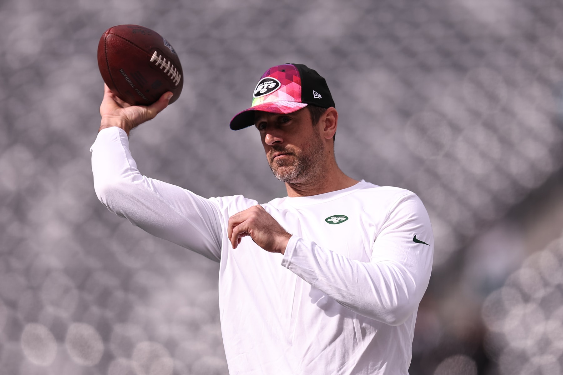 EAST RUTHERFORD, NEW JERSEY - OCTOBER 15: Aaron Rodgers #8 of the New York Jets throws the ball prior to the game against the Philadelphia Eagles at MetLife Stadium on October 15, 2023 in East Rutherford, New Jersey. (Photo by Dustin Satloff/Getty Images)